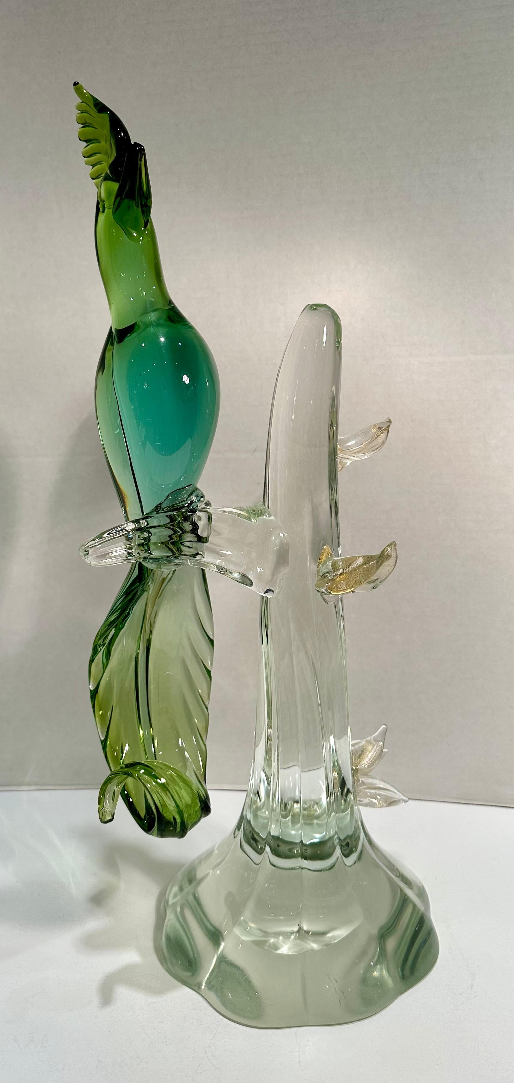 Magnificent large Salviati Murano Italy hand-made and mouth-blown glass figurine of an exotic bird with feathered plume and sweeping tail. The green color at the head and plume fades down into an emerald green body that becomes a lighter green in