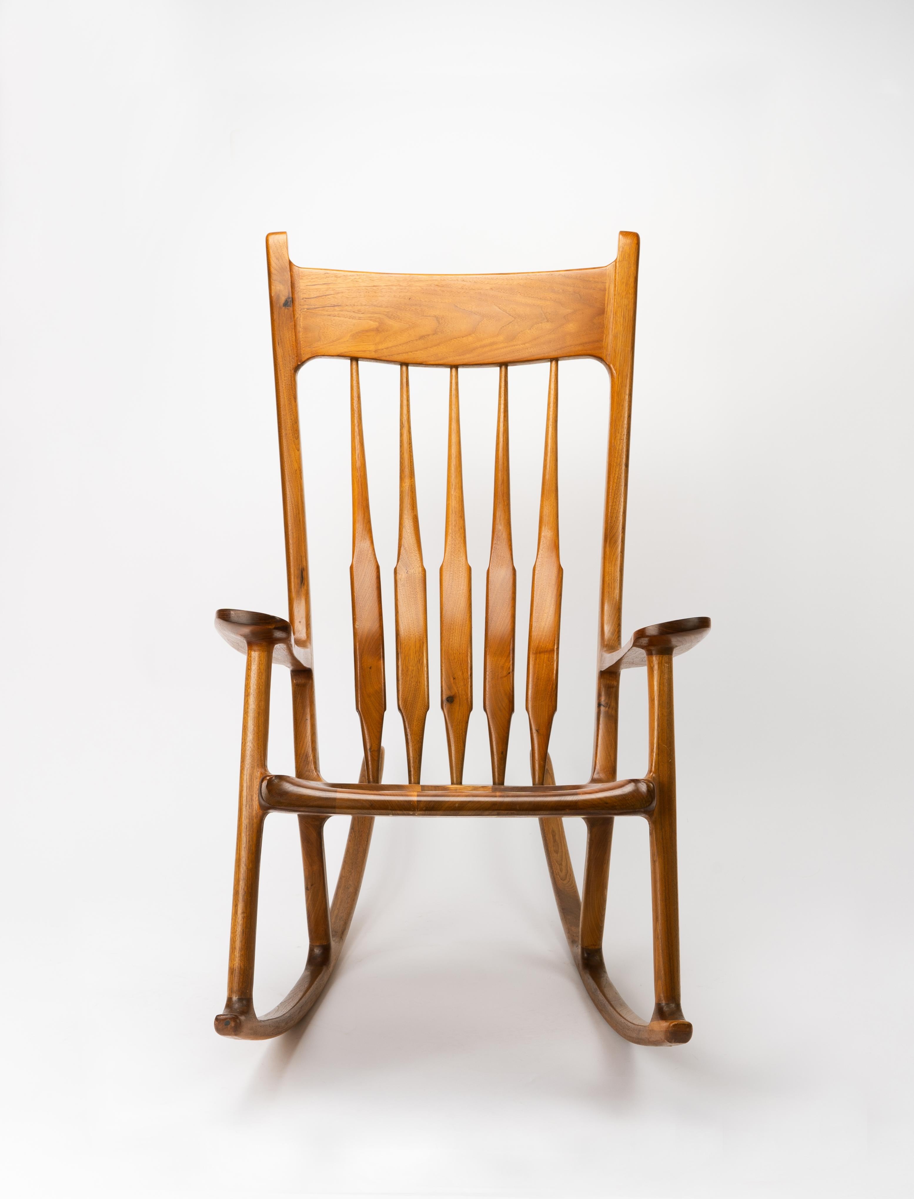 Sam Maloof was an American furniture designer, known for his trademark sculptural style and utilization of the utmost quality in materials.
 
He was a prolific designer, with works still showcased in galleries and museum across the country, but