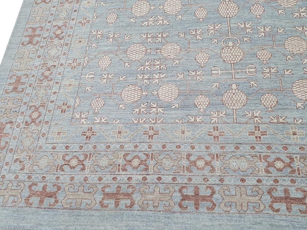Khotan Design Pomegranate rug
A large sized rug with traditional Samarkand Khotan design, hand knotted in Afghanistan in Khotan style. The pile is made of wool - hand spun, hand dyed with all vegetable dyes and knotted by master weavers. The rug is