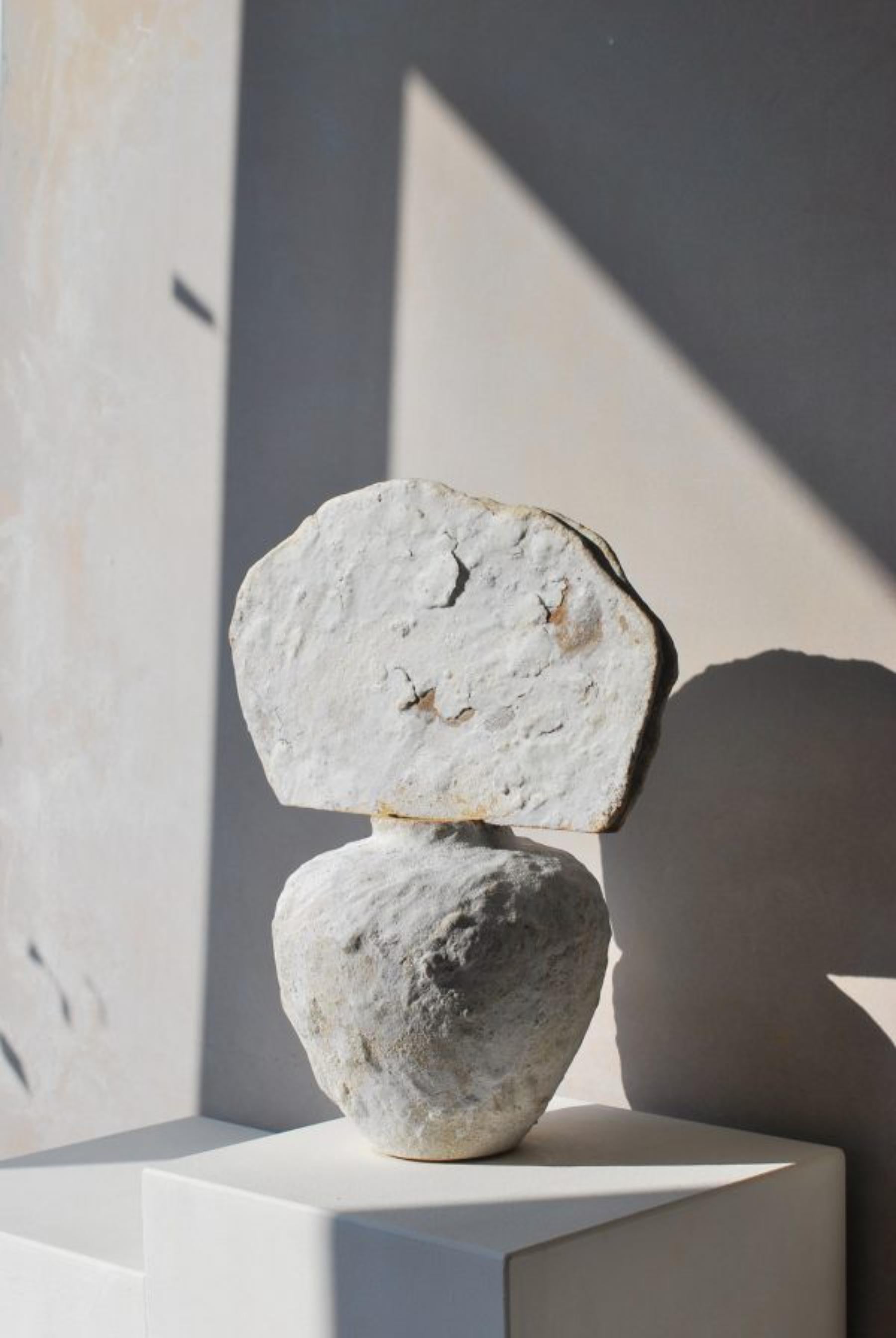 Large Sandstone Vessel Vase by Moïo Studio
Unique Piece
Dimensions: W 32 x D 18 x H 38 cm
Materials: White glaze and porcelain on tan stoneware

Moïo Studio is the Berlin-based ceramic art studio of French-Palestinian artist Maia Beyrouti. It