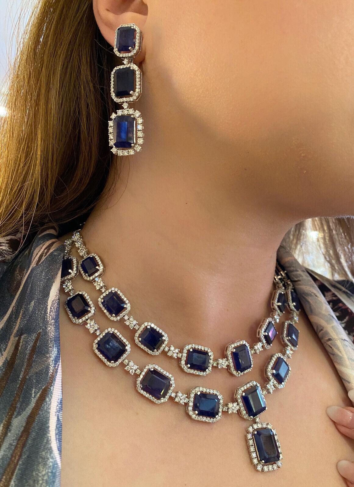 Sapphire and Diamond Necklace and Earrings in 18k White Gold
Features
21 Emerald Cut Natural Blue Sapphires in the Necklace set in two rows
and 6 Emerald Cut Natural Sapphires in the Earrings weighing 93.72 carats in total

Sapphires do not have