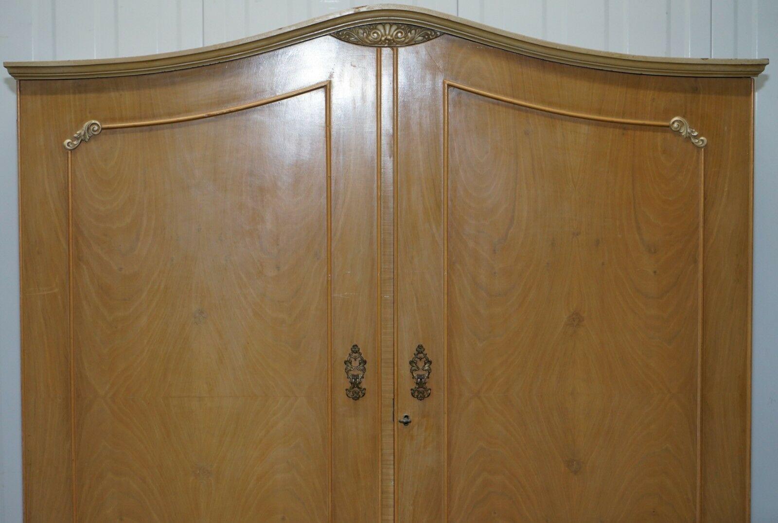 We are delighted to offer for sale this stunning Edwardian walnut cabinet Works London Satin Walnut double bank wardrobe

A very good looking and grand functional piece of furniture, the wardrobe can be split into two pieces for ease of transport.