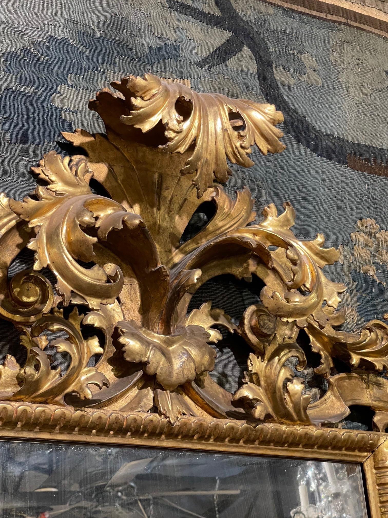 Very impressive large scale 18th century Italian Florentine giltwood mirror. Amazing elaborate carvings and gorgeous gilt finish. A true work of art!!