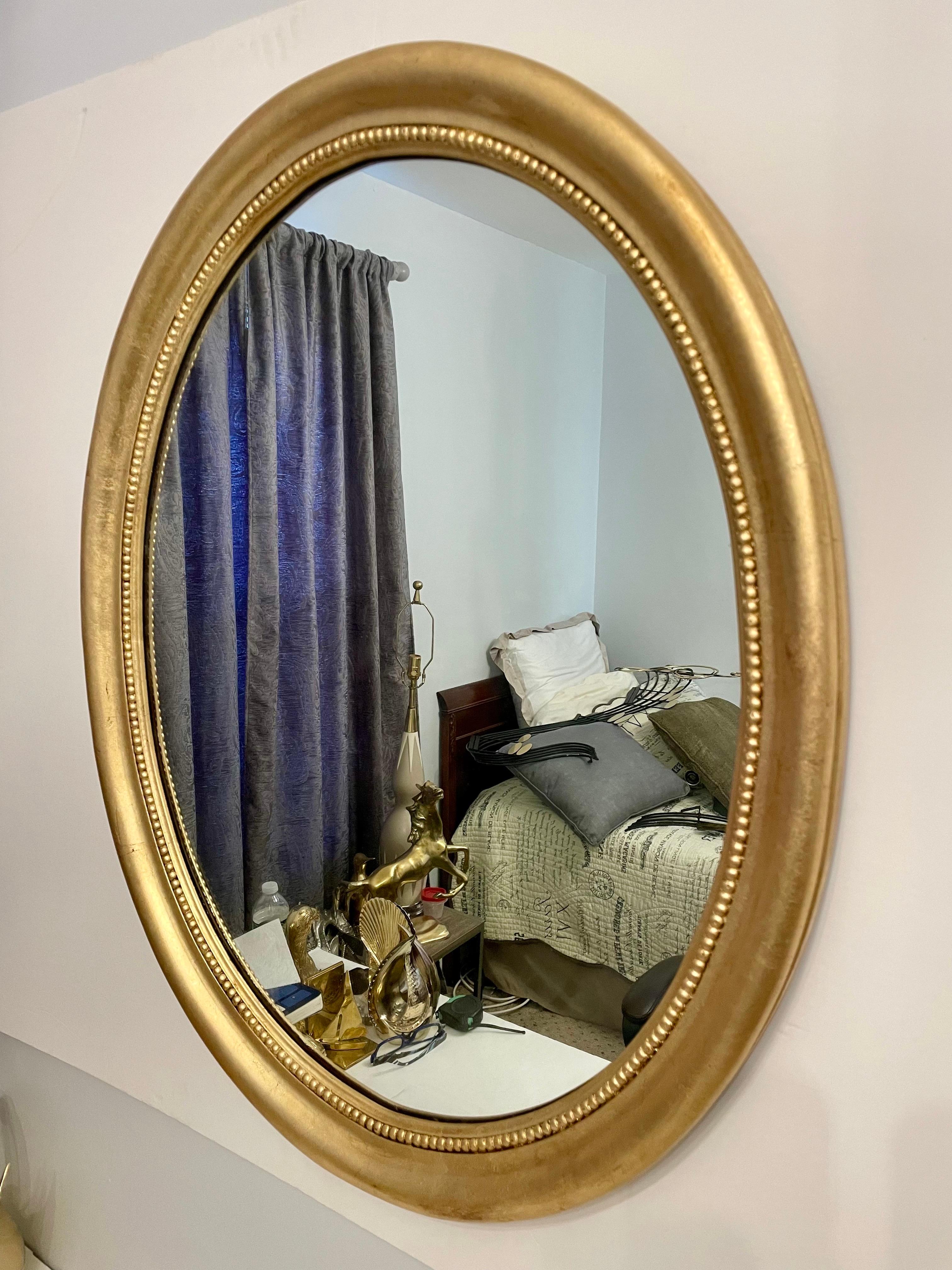 Hollywood Regency Large Scale 1940's Gilt Oval Mirror For Sale