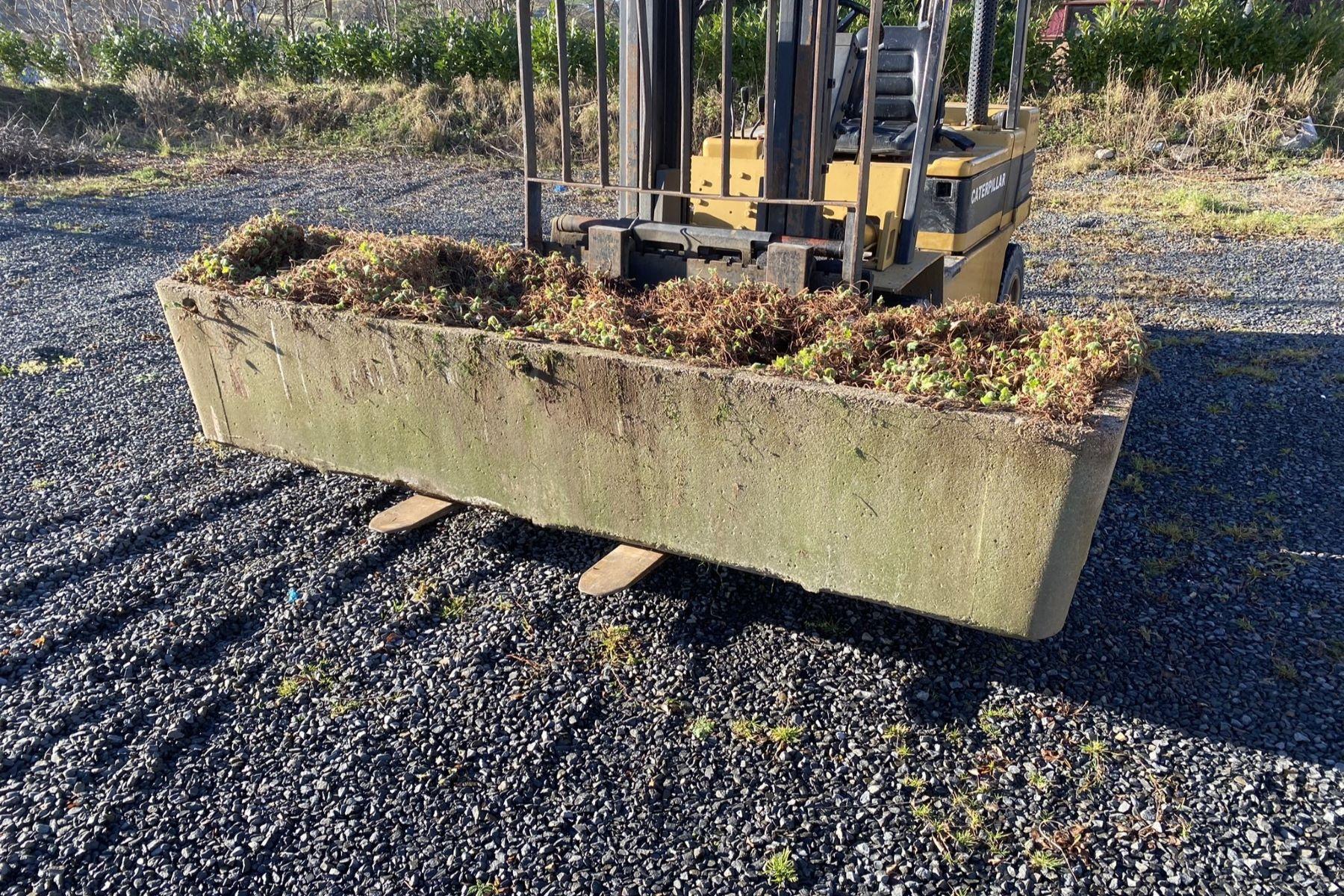 A large scale Mid Century Concrete Planter, freshly salvaged.
The piece is in the style of Willy Guhl - not at all attributed to the designer but certainly of its period, with rounded corners.  Of huge scale at over xx in length, this will make a