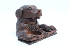 large scale 19th century carved walnut Black Forest dog tobacco box, circa 1860