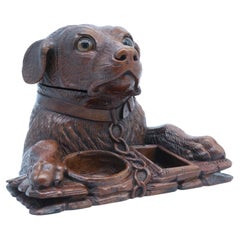 Antique large scale 19th century carved walnut Black Forest dog tobacco box, circa 1860 