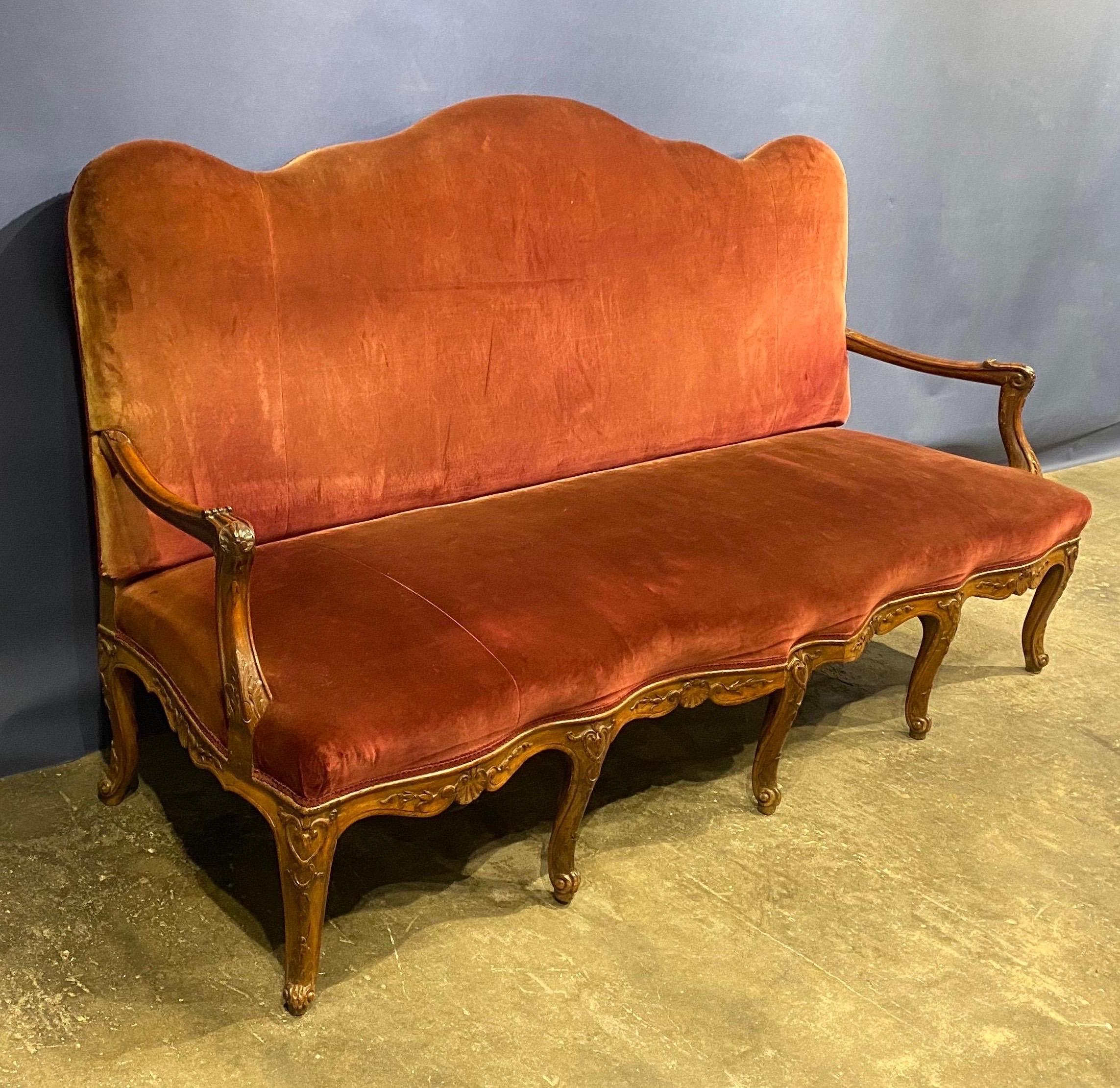 Large Scale 19th Century French Carved Walnut Serpentine Sofa In Good Condition In Charleston, SC