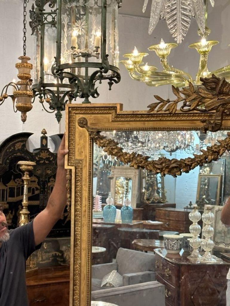 Large Scale 19th Century Louis XVI Carved and Giltwood Floor Mirror In Good Condition For Sale In Dallas, TX