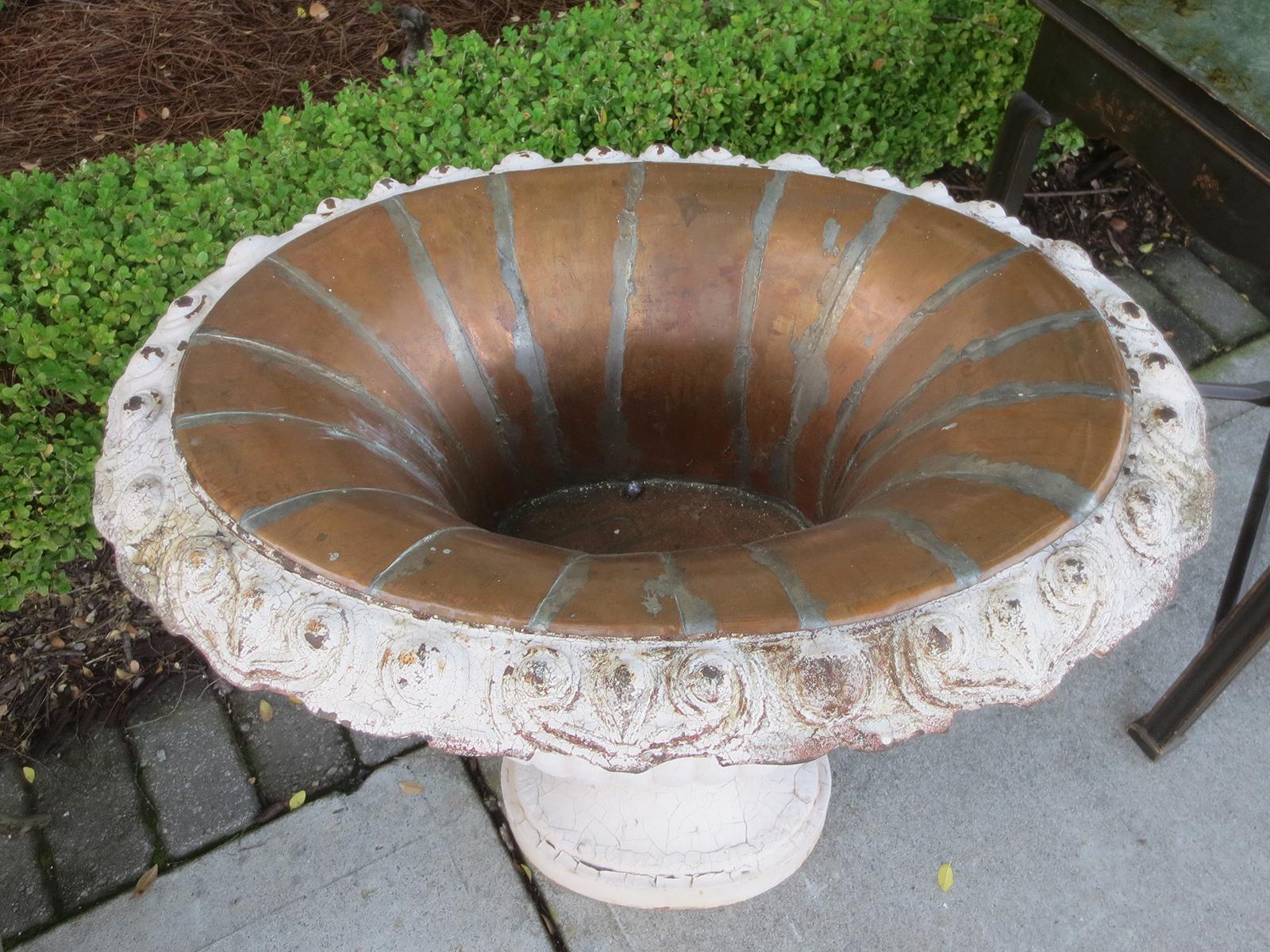 Large scale 19th century painted iron urn with copper liner.