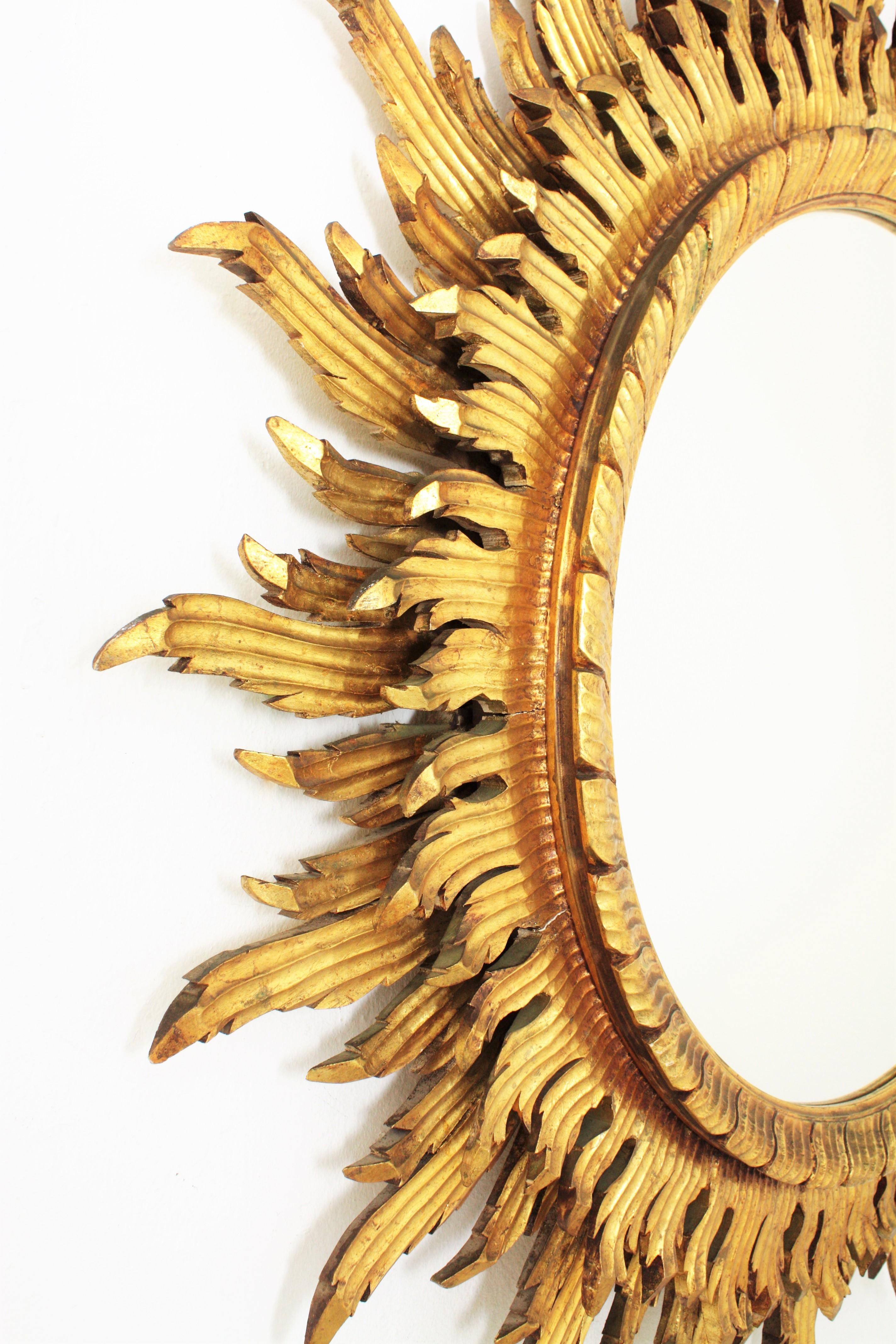 Mid-20th Century Large Scale 20th Century Spanish Double Layered Carved Giltwood Sunburst Mirror