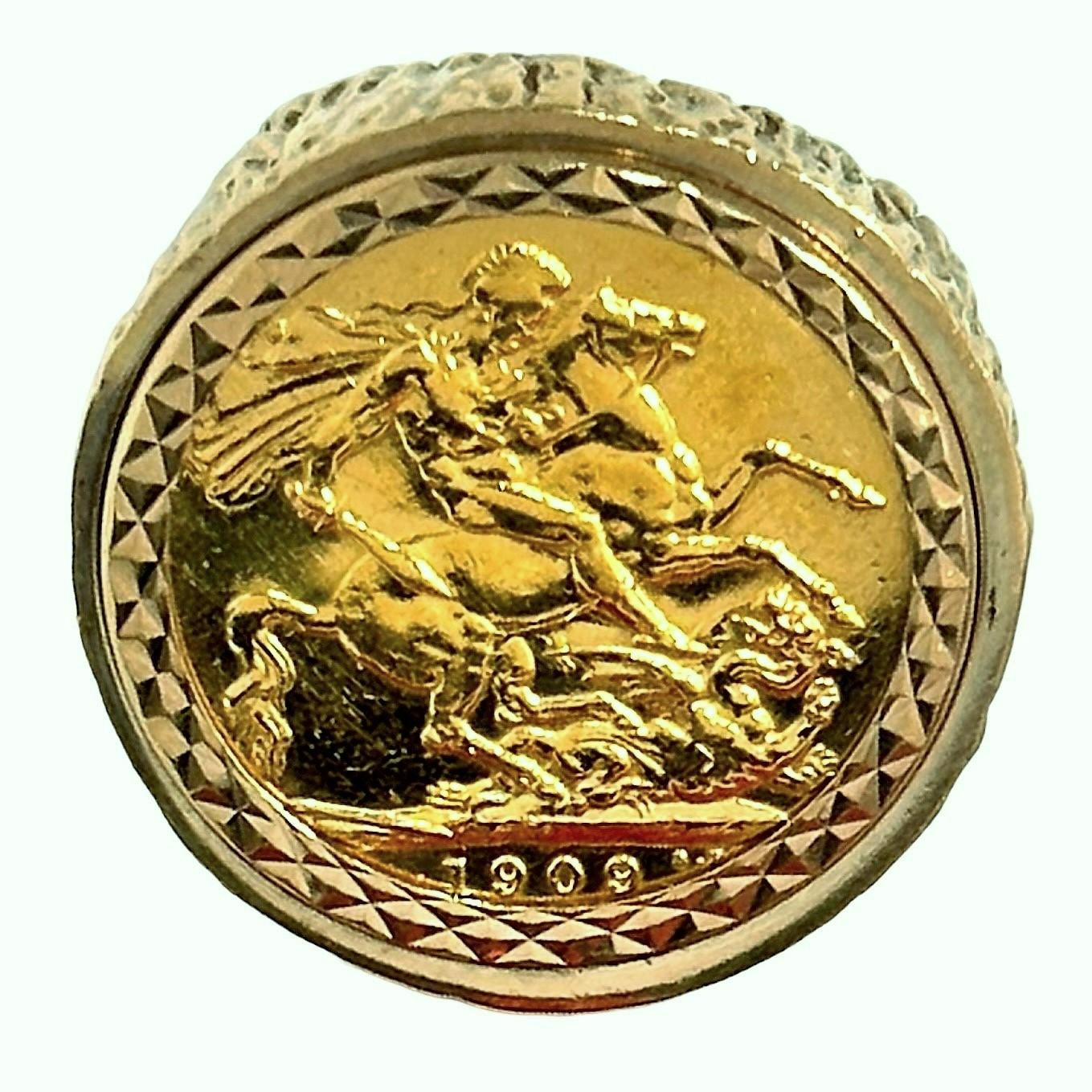This Mid-20th century free form ring is crafted in richly textured 9k yellow gold.  At the center is set one 22k gold, 1909 British Gold Sovereign Coin. The bezel itself is very decorative, with precision cut trapezoidal motifs. Measures 1 inch in