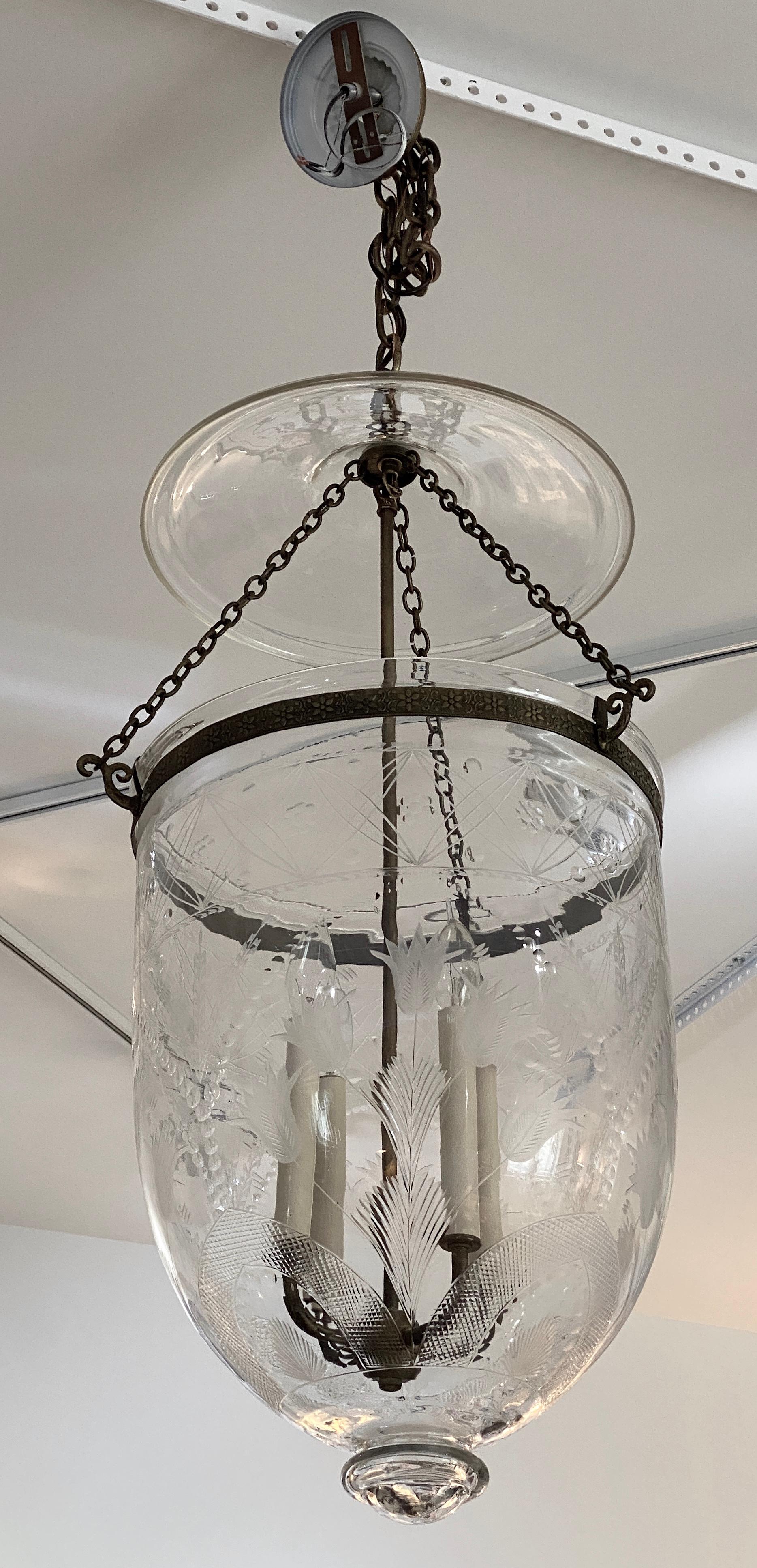 Large scale Anglo-Indian Hundai Bell Jar Lantern, hand engraved and crafted by artisans, acquired from a Palm Beach estate.

Note: Requires 4 chandelier bulbs.

Note: The overall drop including the bell jar, chain and ceiling canopy is approximately