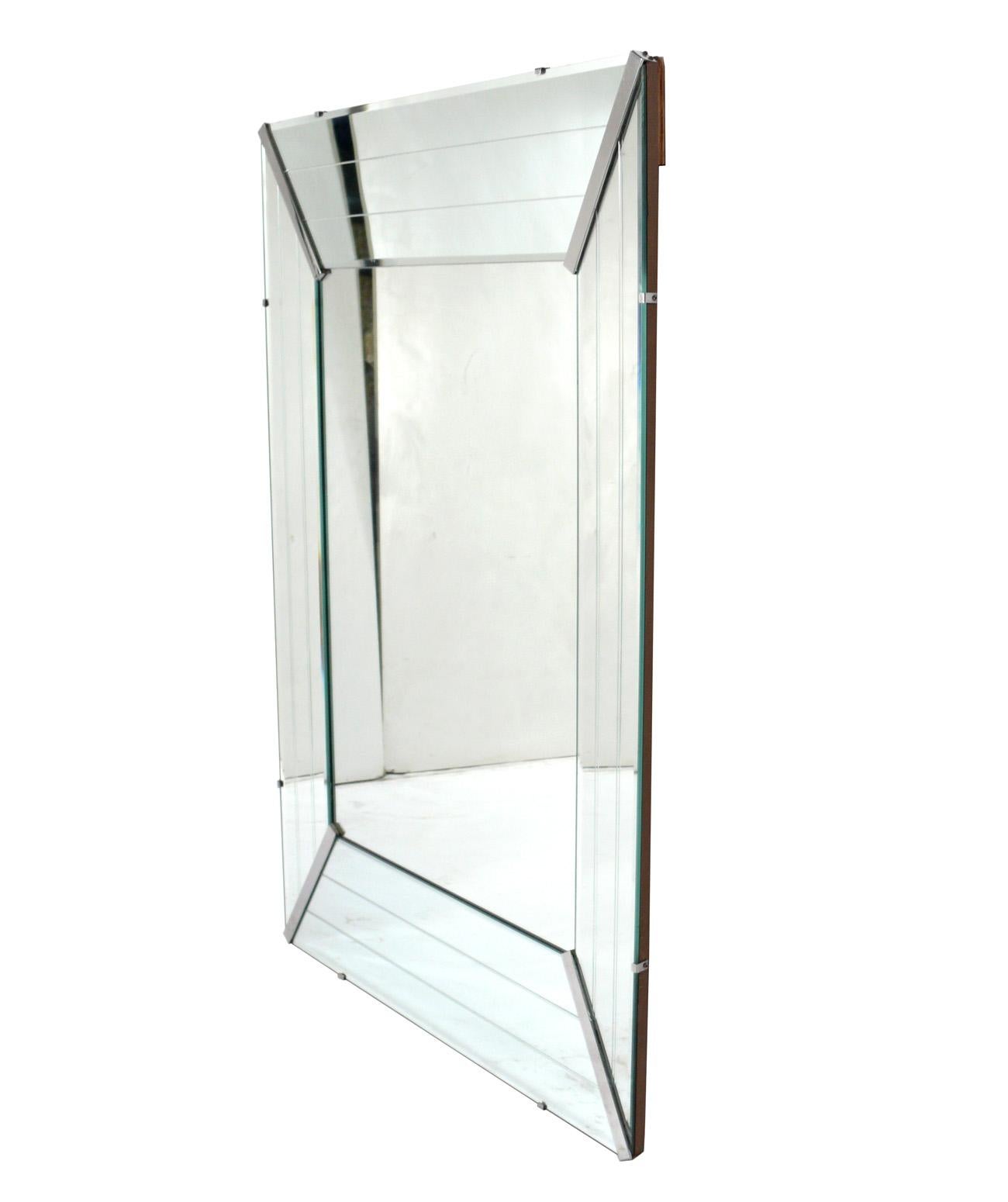 Large scale Art Deco mirror with nickel trim, American, circa 1930s. Retains warm original patina. This mirror measures an impressive 59