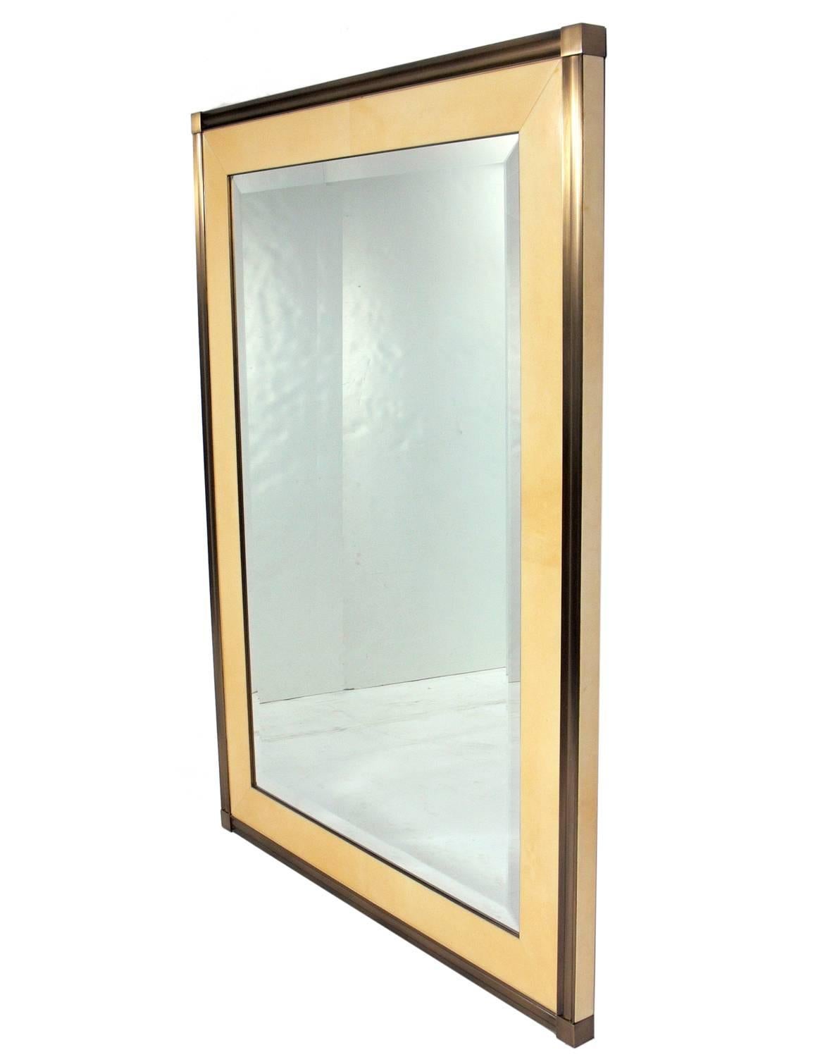 Large-scale brushed bronze and lacquered goatskin mirror, custom-made for Lorin Marsh, circa 1990s. It measures an impressive 65