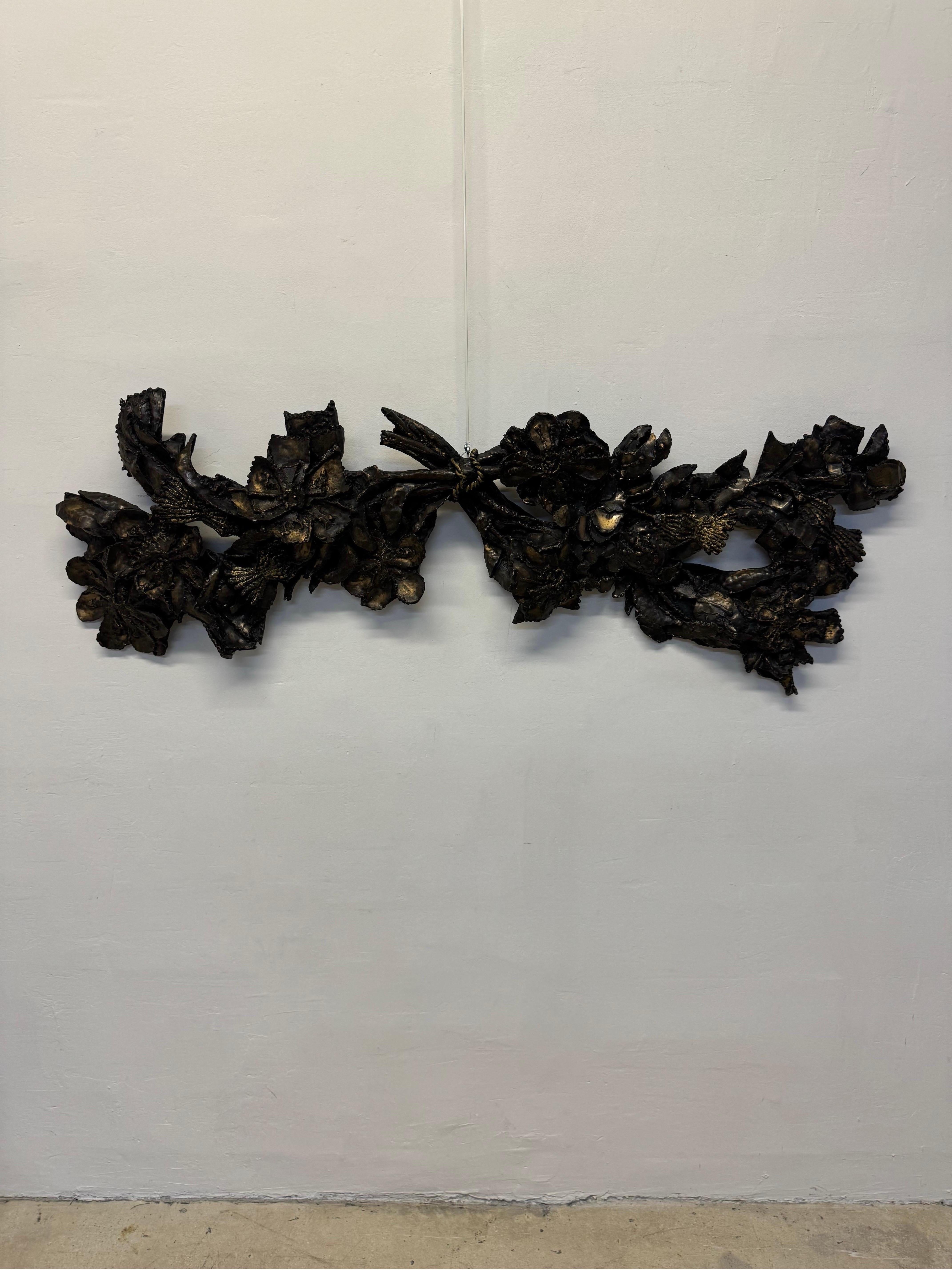 Finesse Originals brutalist wall sculpture of tree branches wrapped with rope rendered in fiberglass and resin circa 1970s.