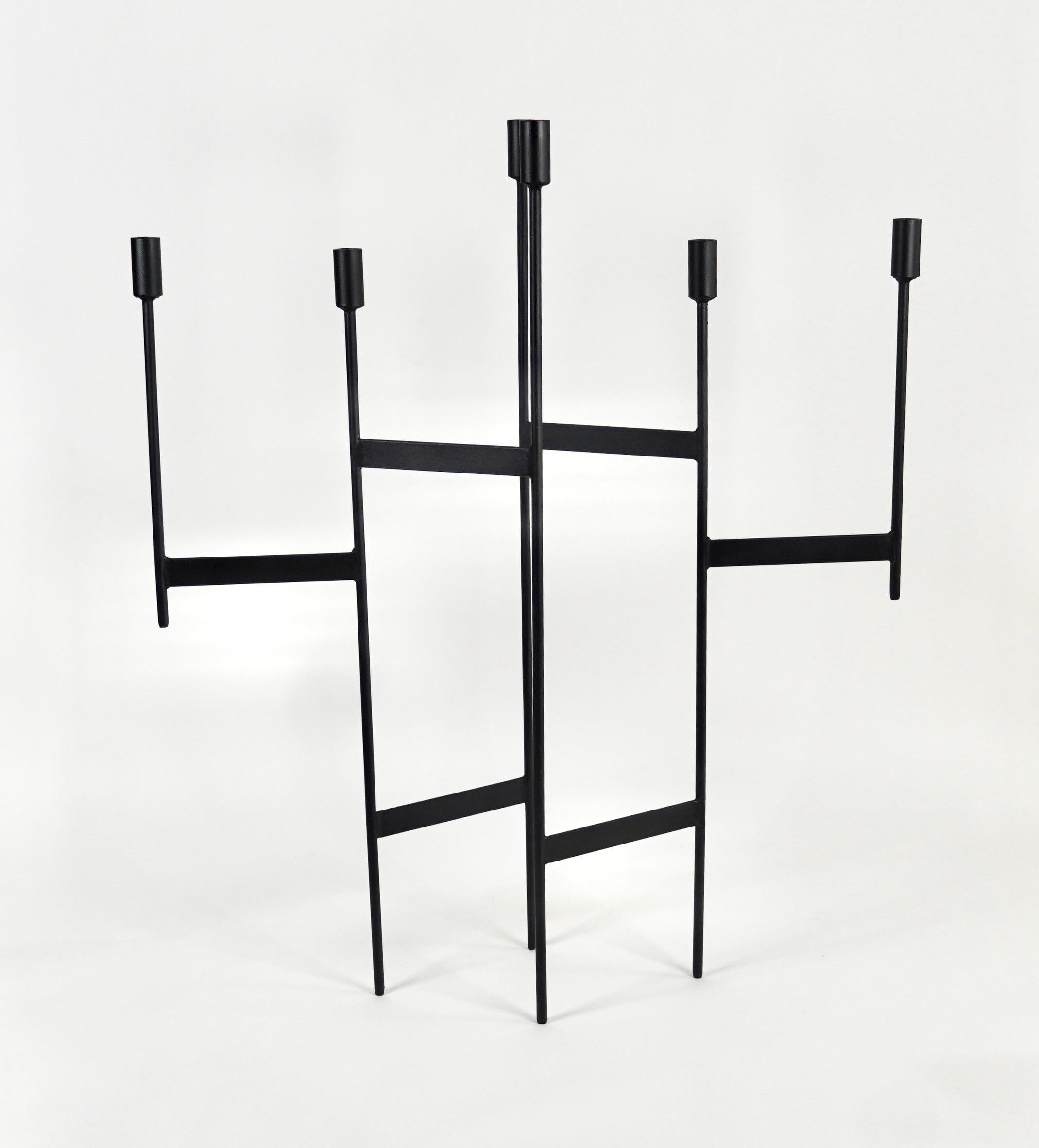 Early 1960s 6 candle candelabra designed by American designer Donald Drumm and sold by Raymor. Black enamel finish on a welded steel frame, the scale of the object can either be used as a stand alone on the floor or a statement piece on a large