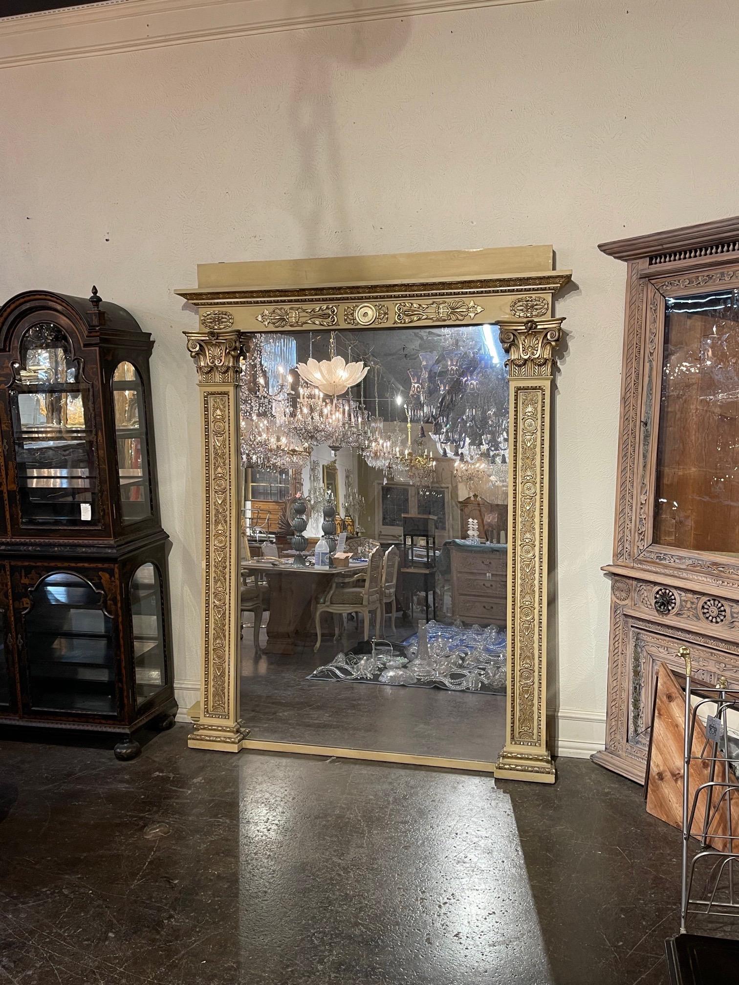 Exceptional large scale carved and parcel-gilt floor mirror. Very fine carvings and fabulous patina on this mirror. Exquisite!!