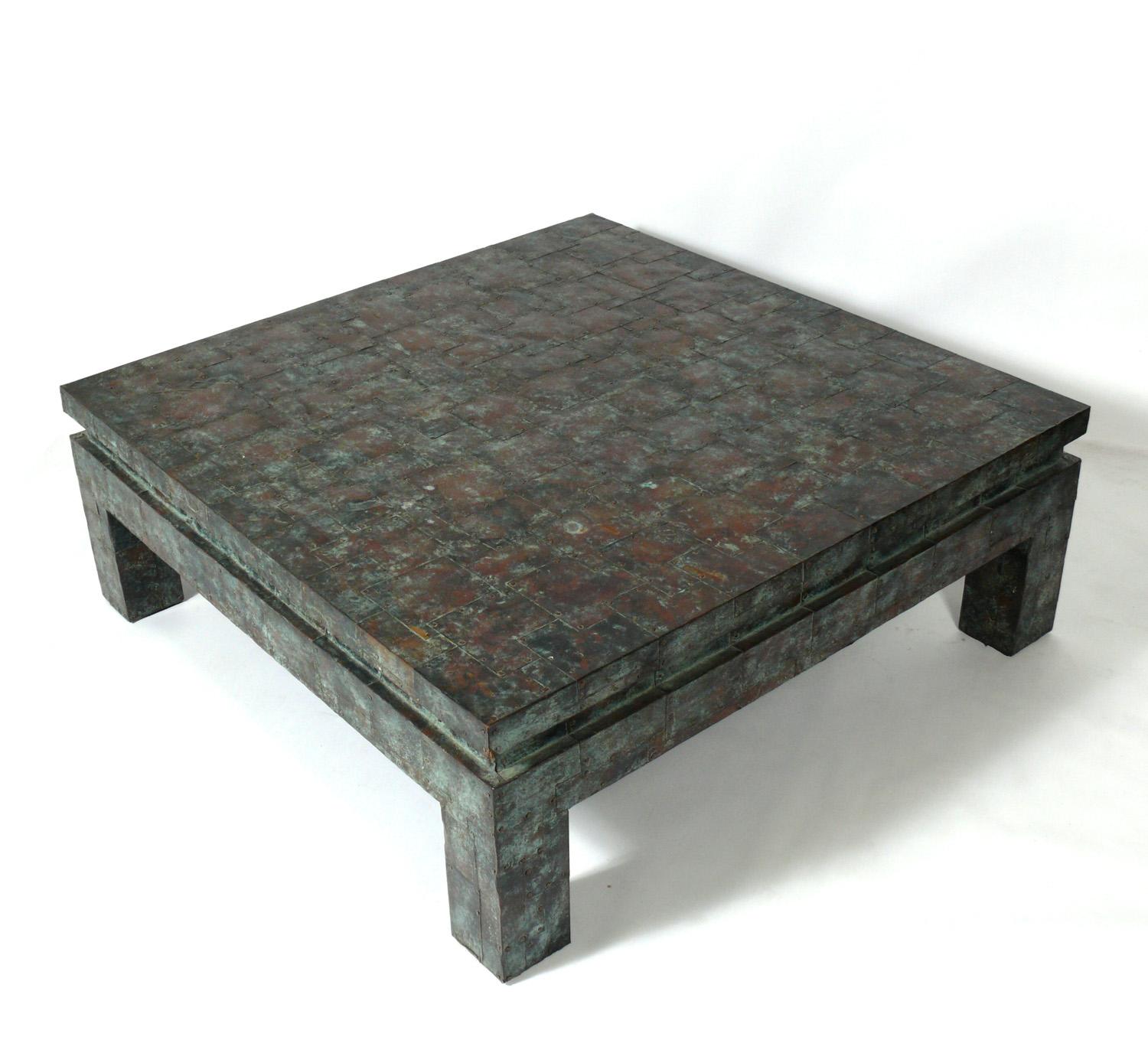 Mid century large scale copper patchwork coffee table, in the manner of Paul Evans, American, circa 1960s. Retains warm original overall verdigris patina. It measures an impressive 50