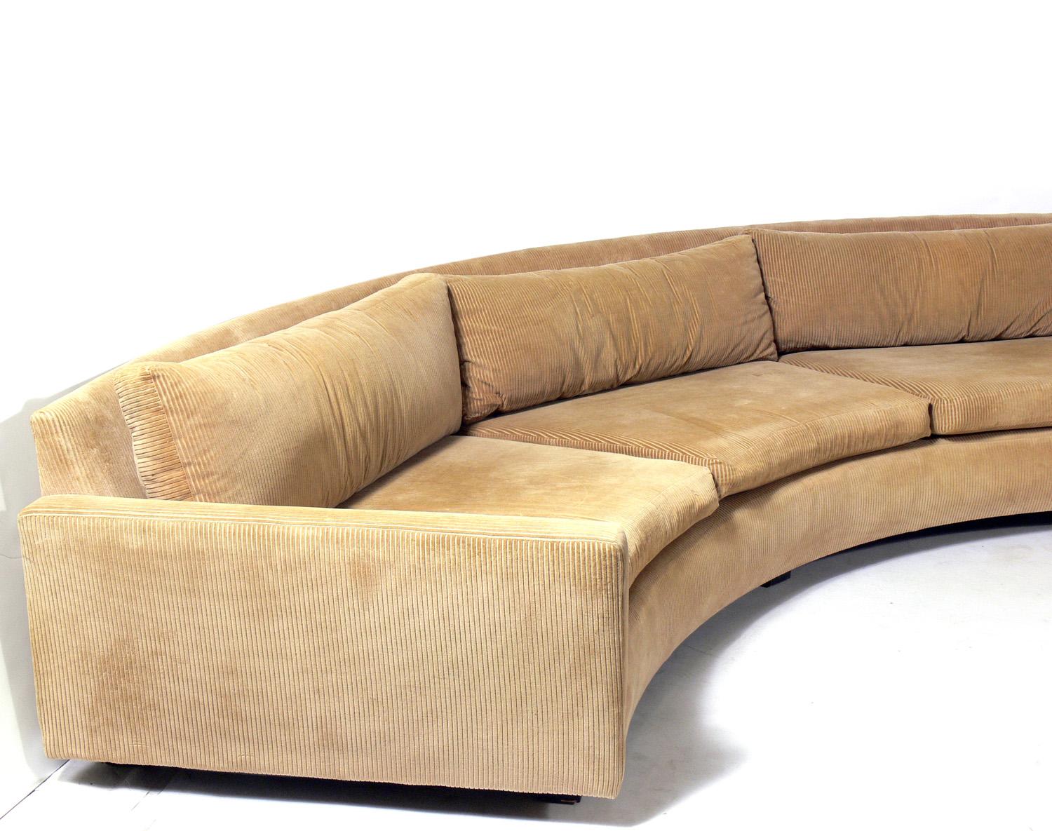 Large scale curved sectional sofa, designed by Milo Baughman for Thayer Coggin, American, circa 1960s. It is a two section sofa for easier moving. This sofa is currently being reupholstered and refinished and can be completed in your fabric. The