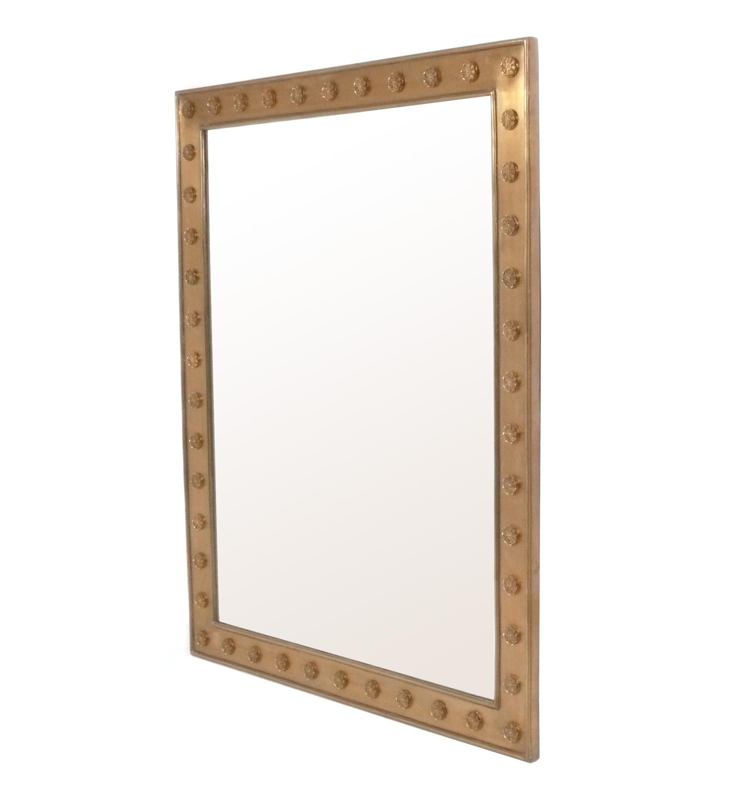 Elegant Custom Bronze or Brass Mirror, attributed to P.E. Guerin, unsigned, circa 2000s. Removed from an apartment at 720 Park Avenue, NY, NY. According to the estate, this was custom made through P.E. Guerin. Heavyweight detailed construction. 