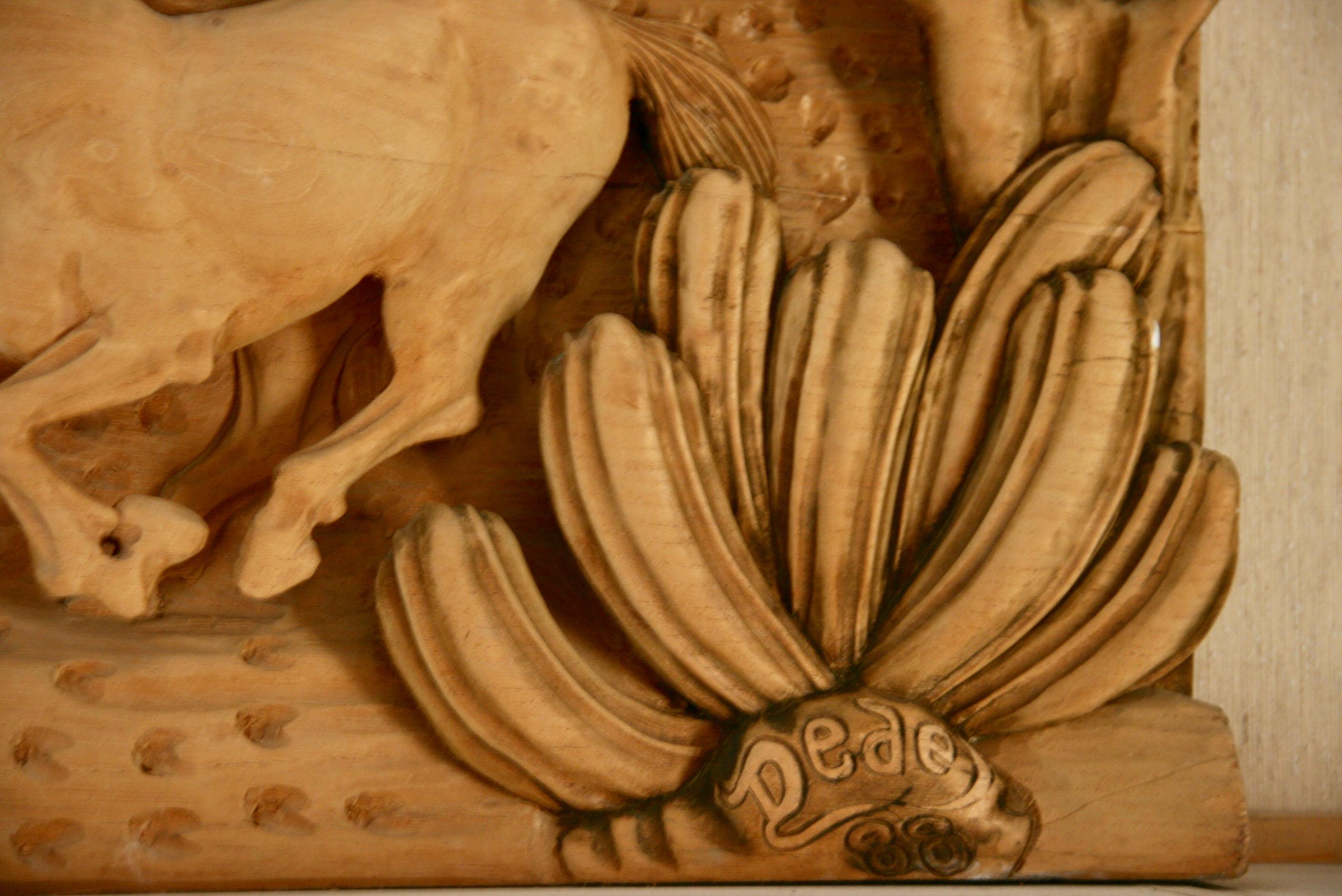 large wooden carved animals