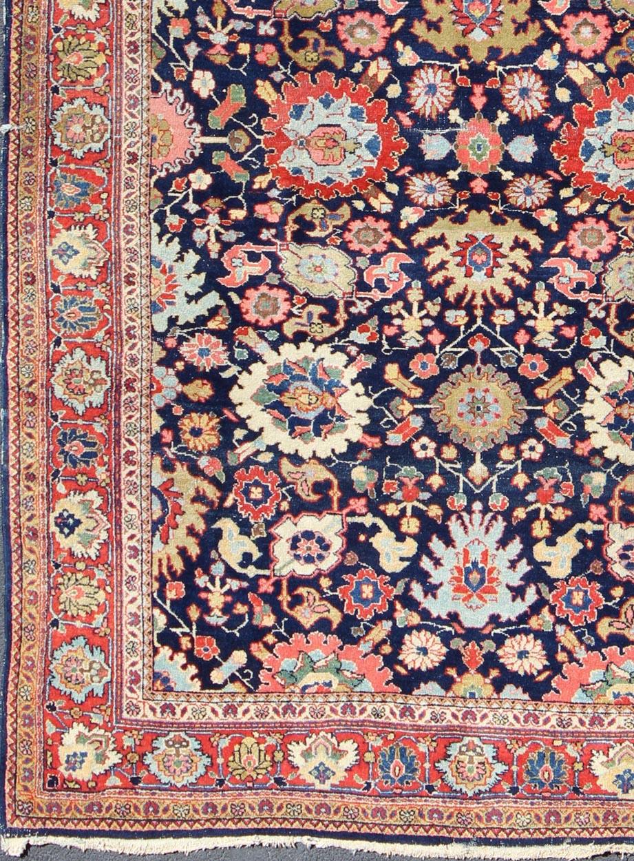 Colorful Mahal antique Persian rug with floral design in multi-colors, rug ema-7564, country of origin / type: Iran / Mahal, circa 1920.

This antique Persian Mahal rug, circa early 20th century, relies heavily on exquisite details as well as