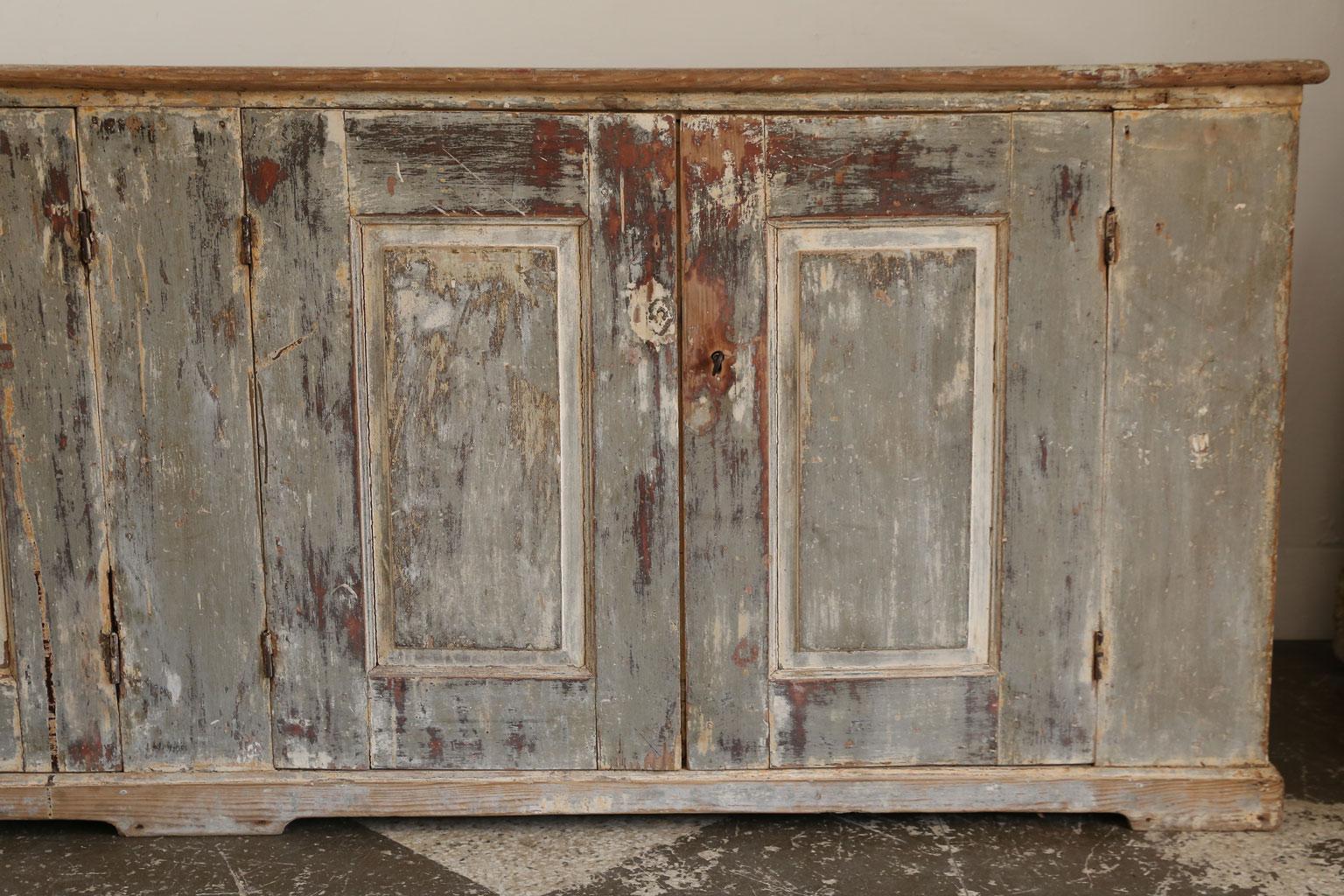 Large scale gray painted French enfilade with four doors, working locks and two keys. Remnants of gorgeous bluish gray and beige paint.