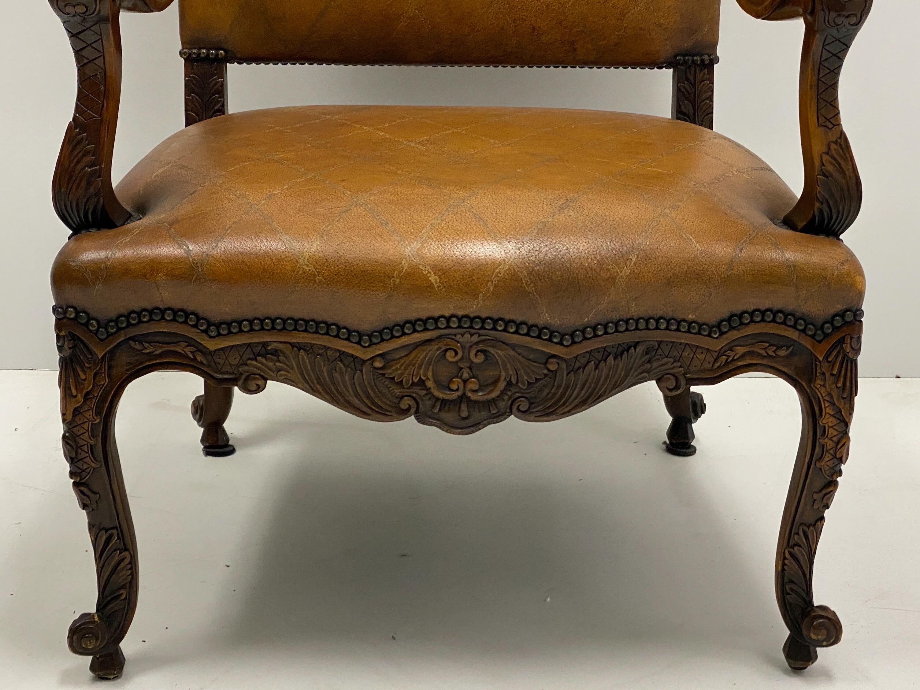 20th Century Large Scale French Louis XV Style Carved Fruitwood Tooled Leather Bergere Chair For Sale