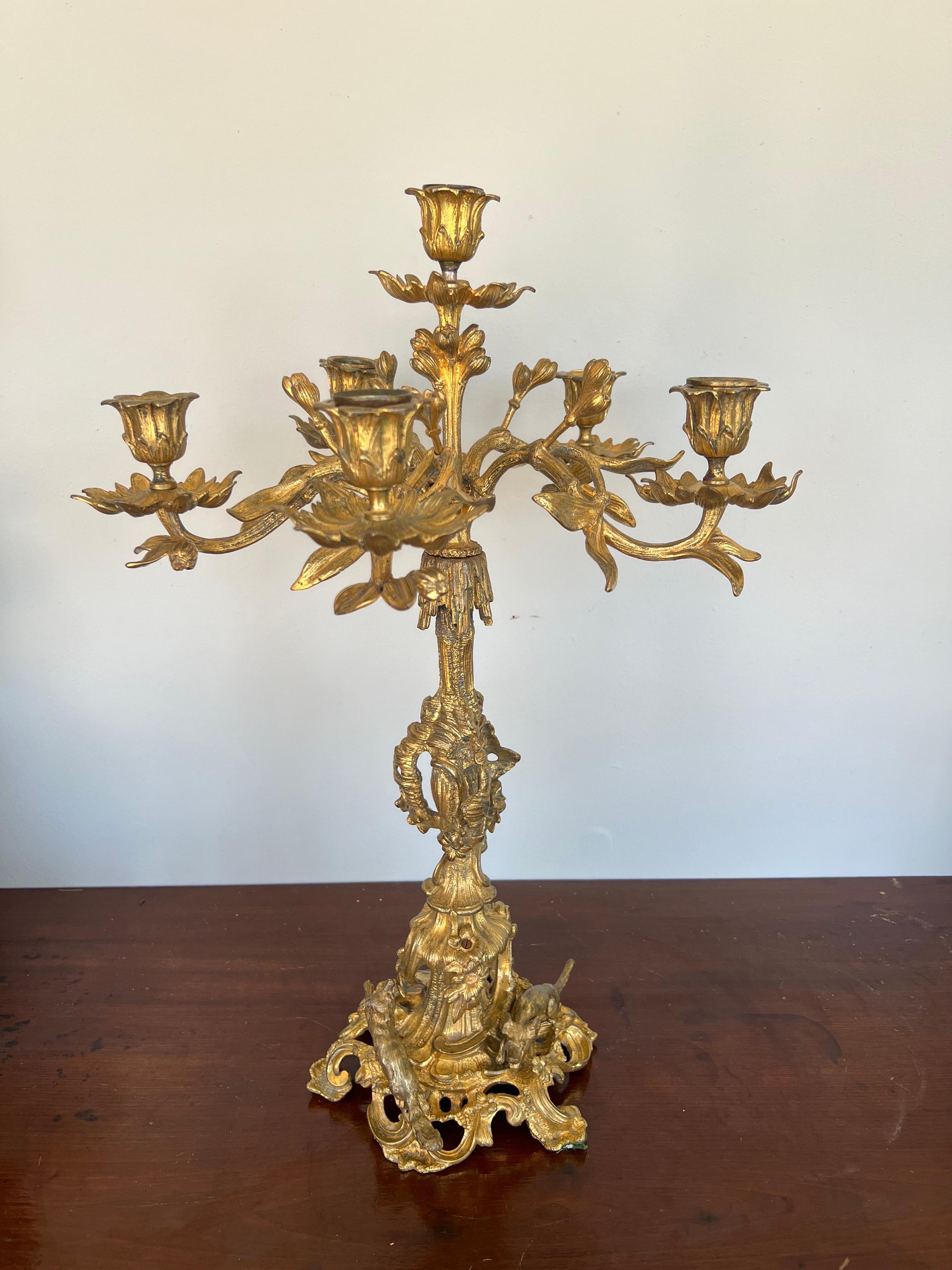French, late 19th century. Good Quality

Behold the epitome of grandeur and sophistication: a truly magnificent Large Scale Gilt Bronze 6-Light Candelabra, resplendent with an enchanting Fox & Dog Hunting Scene. This opulent masterpiece commands