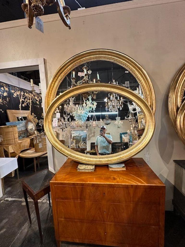 Beautiful large-scale gold leaf Louis Philippe mirrors. Featuring a very nice patina and a floral pattern. Very special! Note: Price listed is for one.