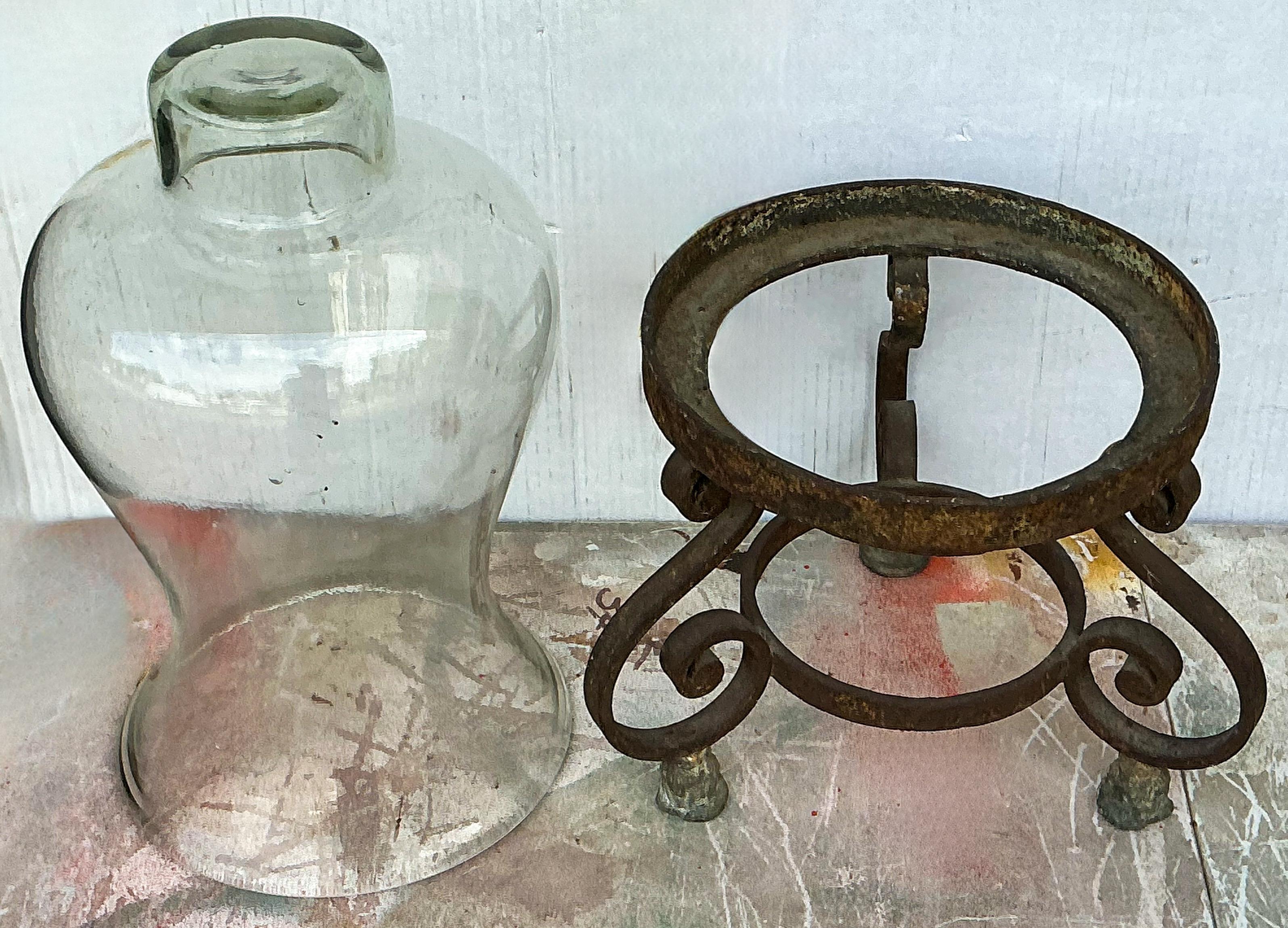 Rustic Large Scale Hand Forged Iron And Blown Glass Hurricane Style Candle Holder For Sale