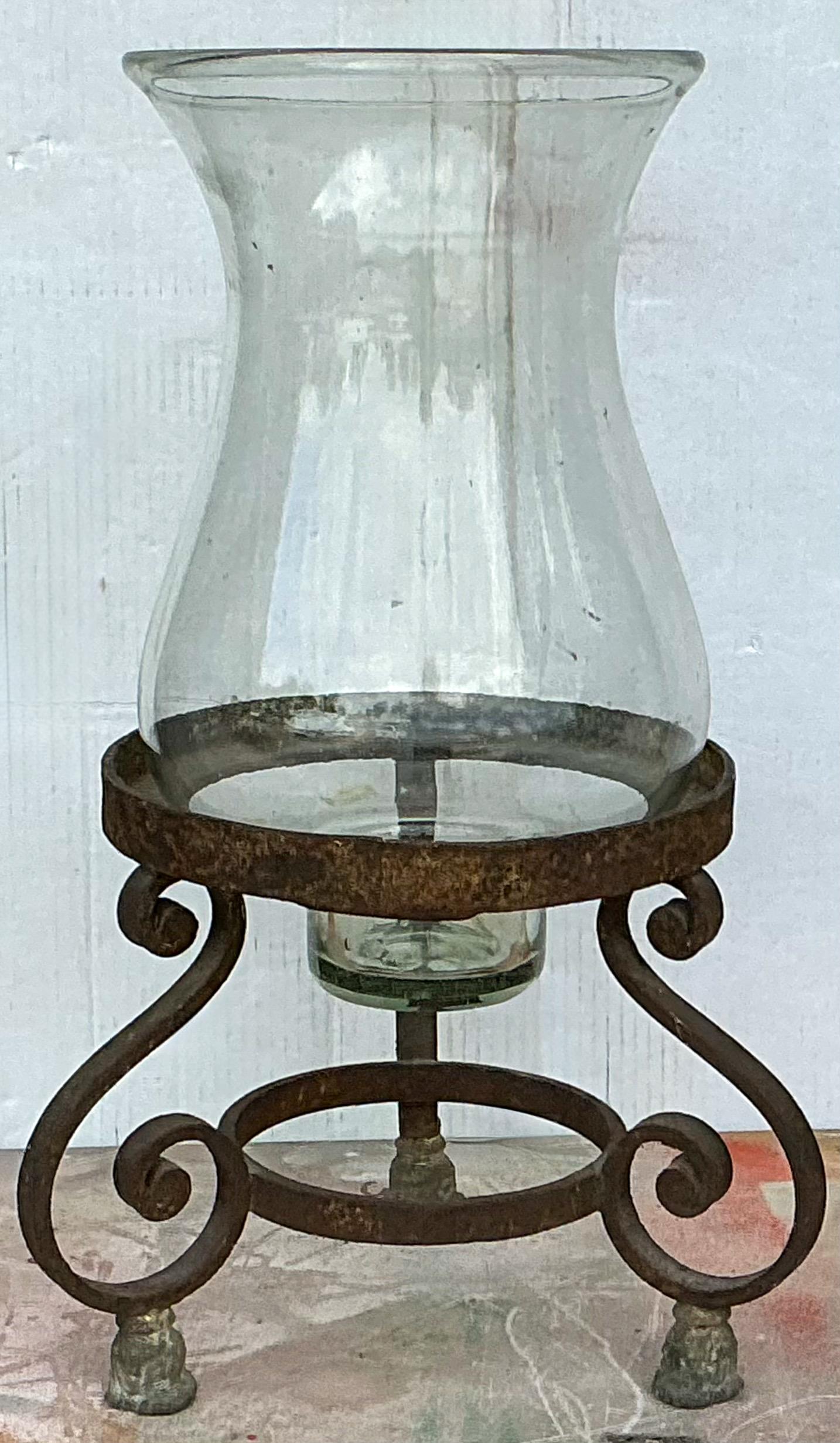 North American Large Scale Hand Forged Iron And Blown Glass Hurricane Style Candle Holder For Sale