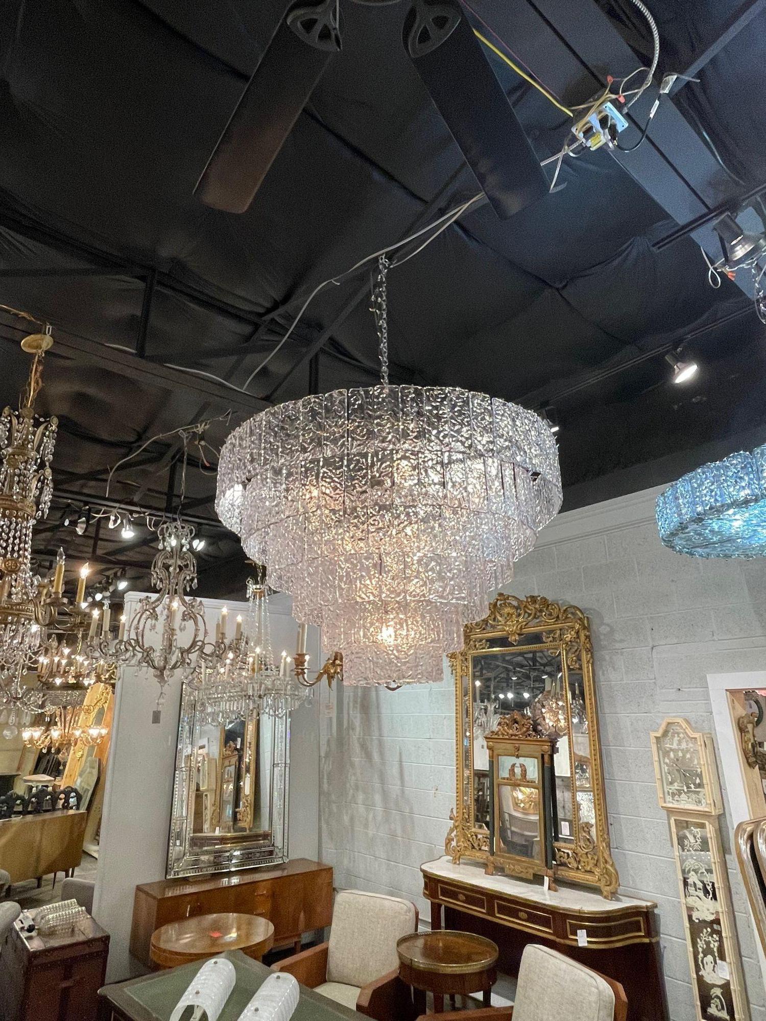 Very fine large scale Murano Glass waterfall Chandelier. Featuring beautiful translucent textured glass. Makes an extremely impressive statement!