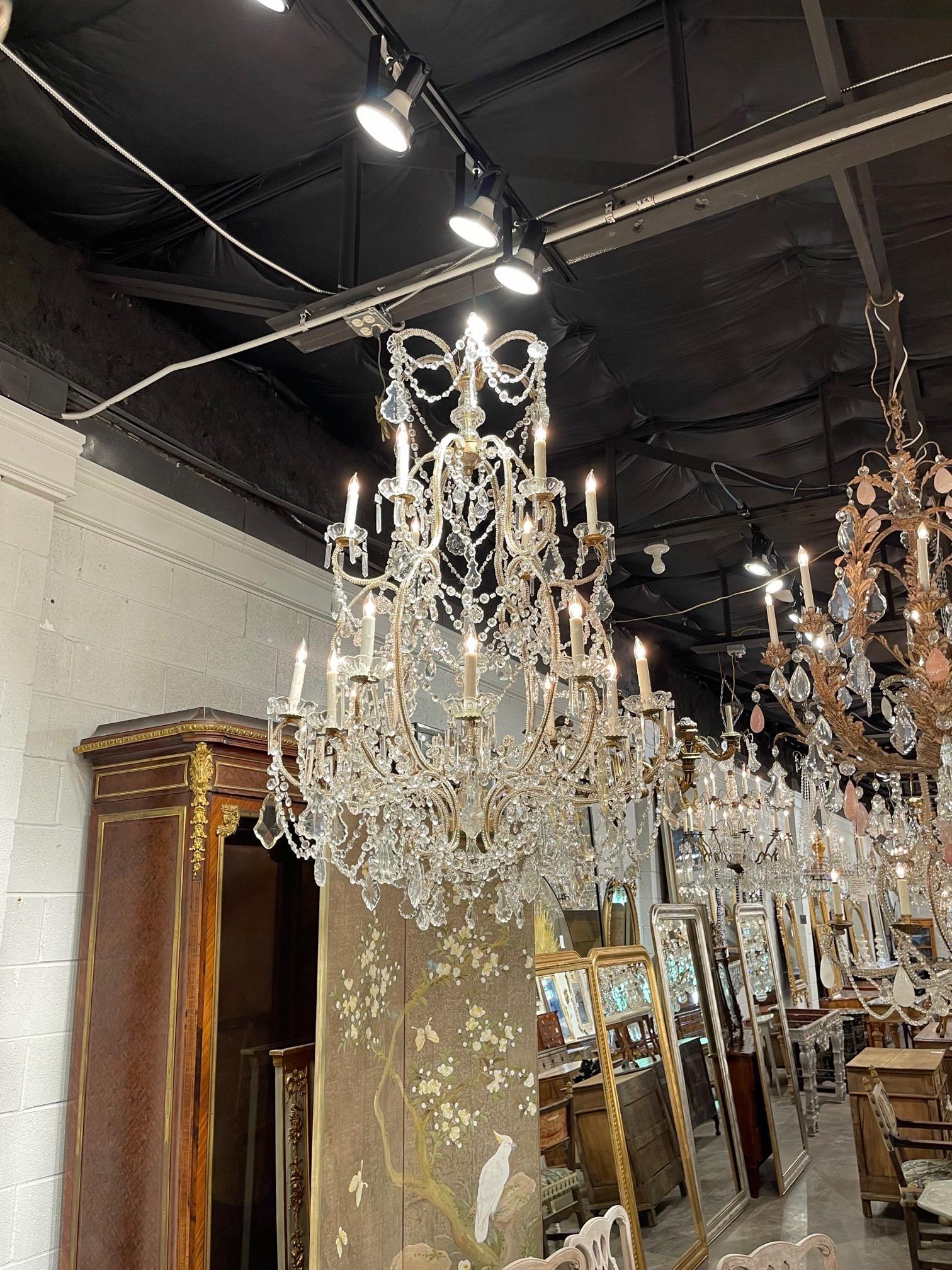Gorgeous large scale Italian beaded chandelier with 18 lights. Covered in beautiful crystals and beads. Very elegant!! Creates an amazing presence!