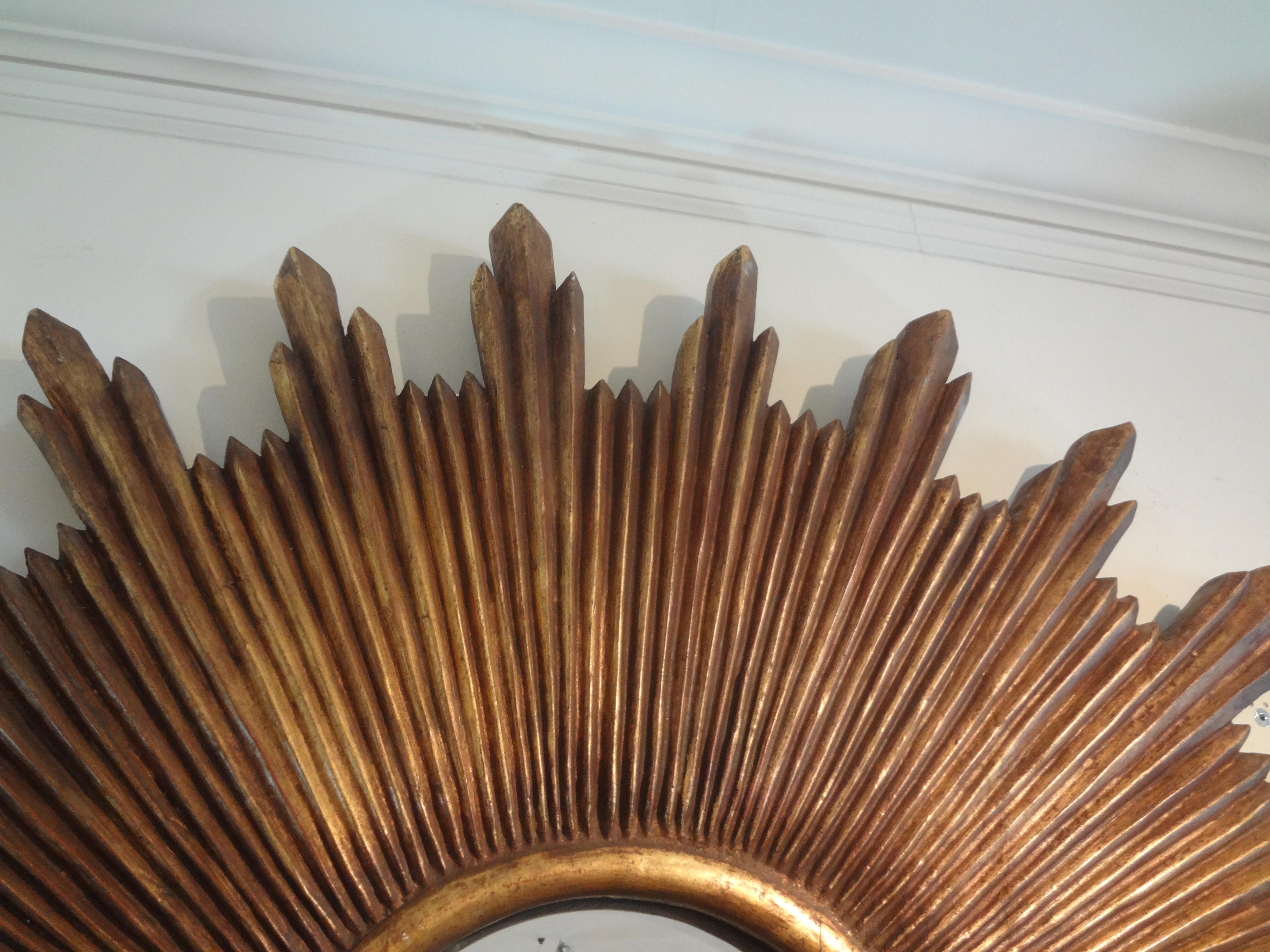 Large Scale Italian Carved Giltwood Sunburst Convex Mirror In Good Condition In Houston, TX