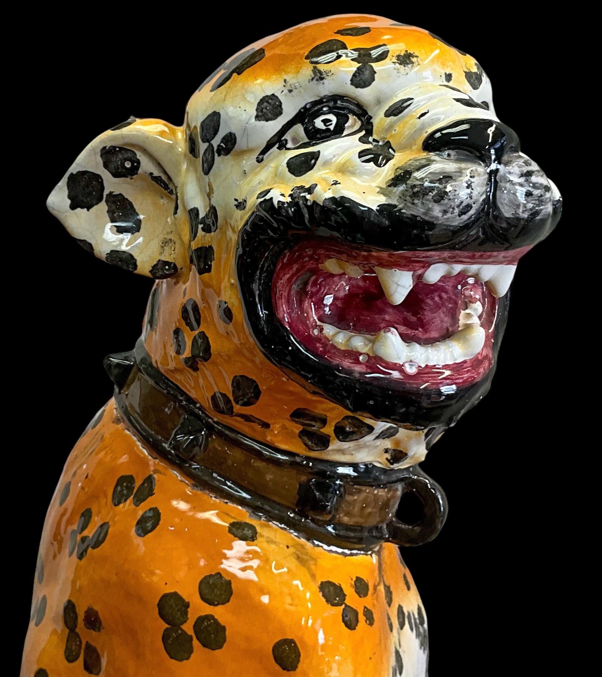 This is a wonderful large scale Hollywood Regency Era terracotta seated cheetah / leopard  attributed to  Meiselman Imports. What a face! He has a vibrant majolica glaze and is in very good condition. 

My shipping is running two to five weeks, and