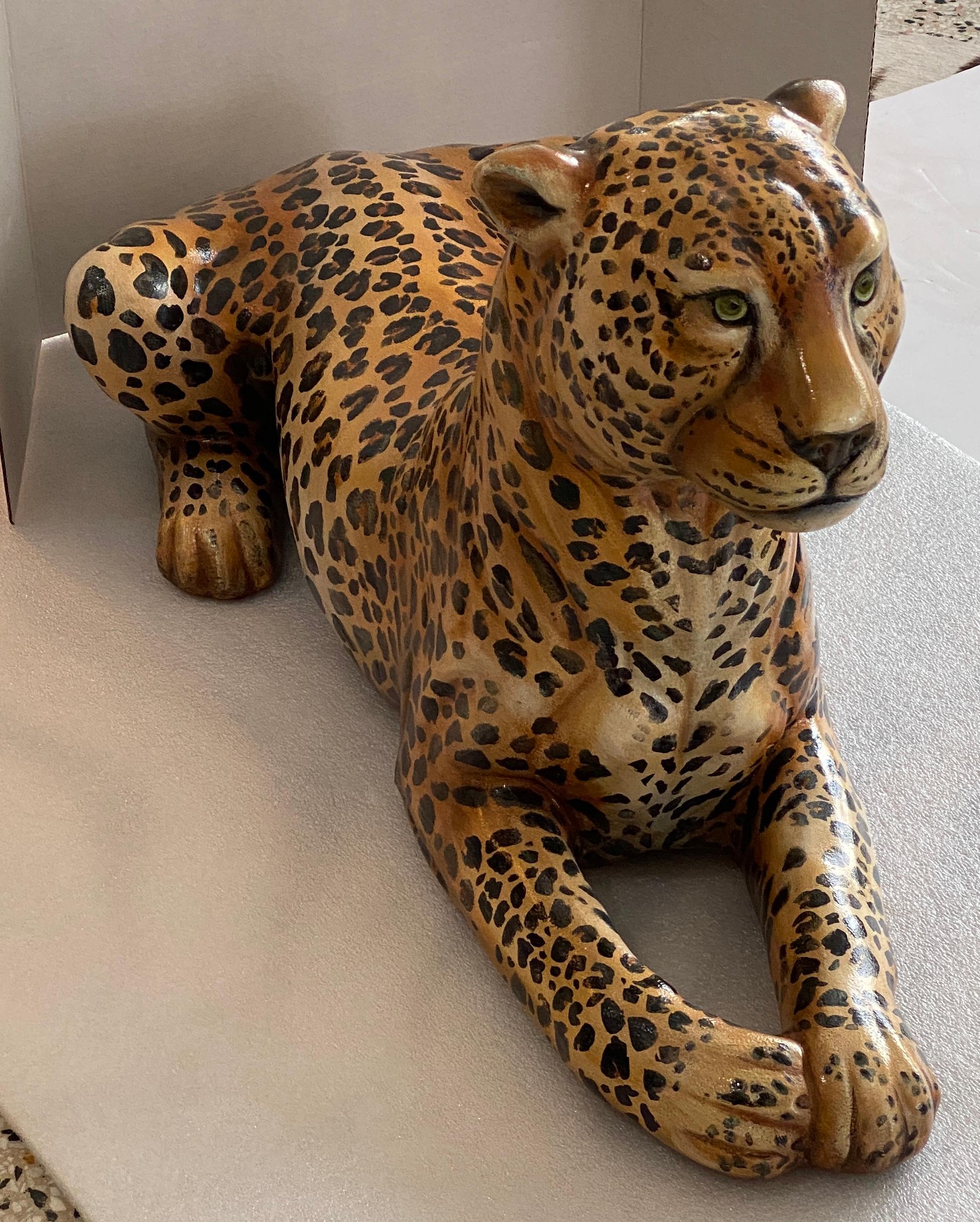 This stylish, chic and large scale figure of a leopard will make a dramatic statement with its form and hand-painted finish.