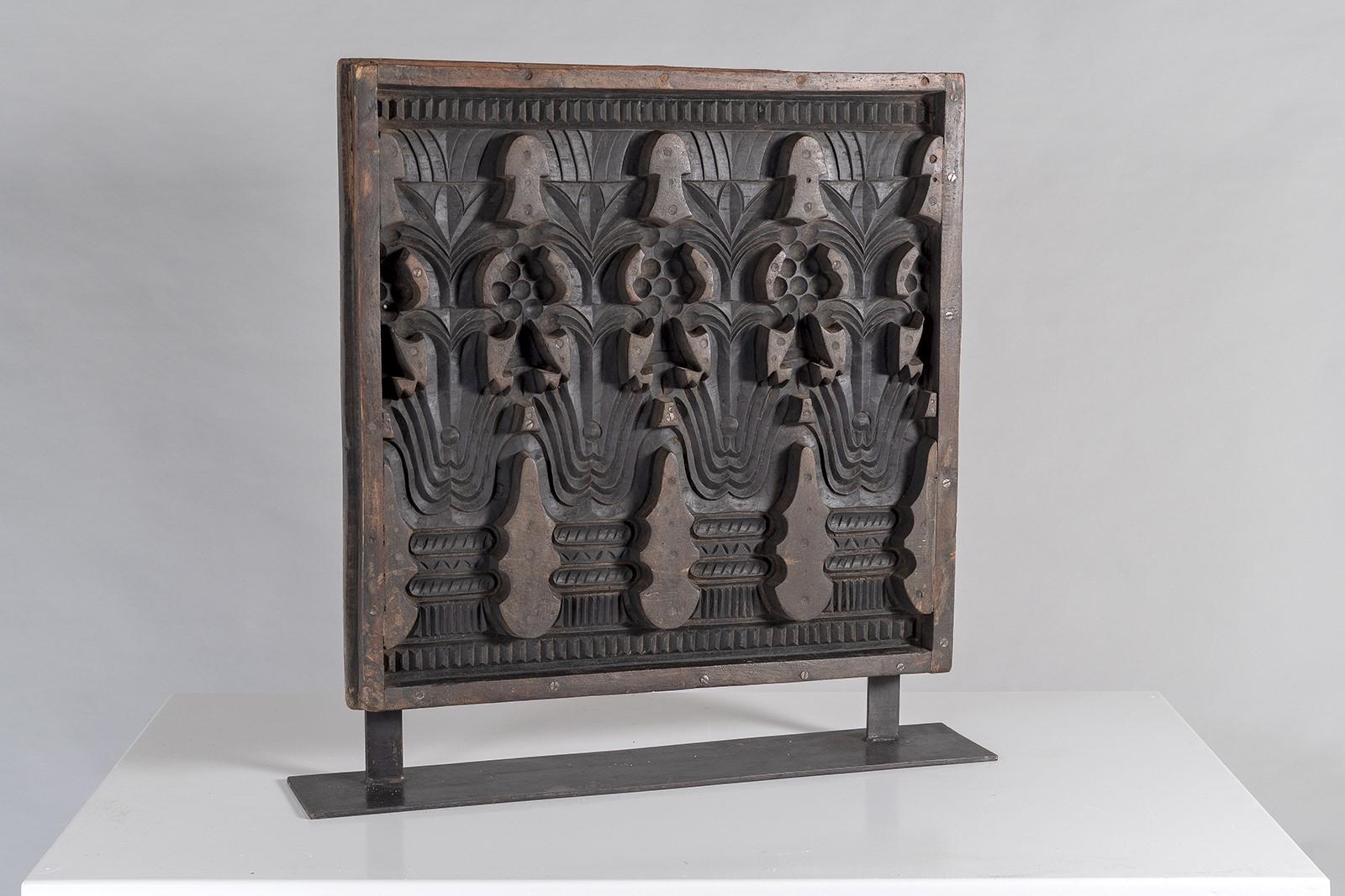 An impressive large scale sculptural wooden shelf art with good form and a beautiful rich warm dark wood colour tone.   These would have been originally carved for use as plaster moulds for producing decorative wall plaques.  Hand carved symmetrical