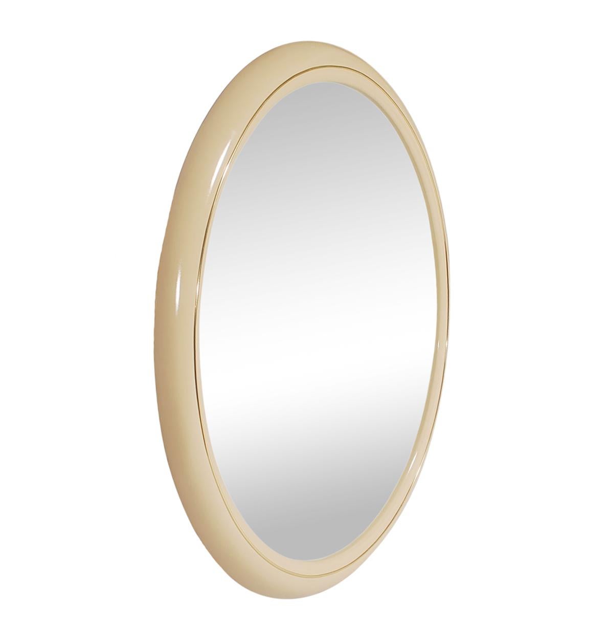 A large circular wall mirror in off-white lacquer from Italy, circa 1970s. It features a solid wood frame with off-white lacquer and brass trim.