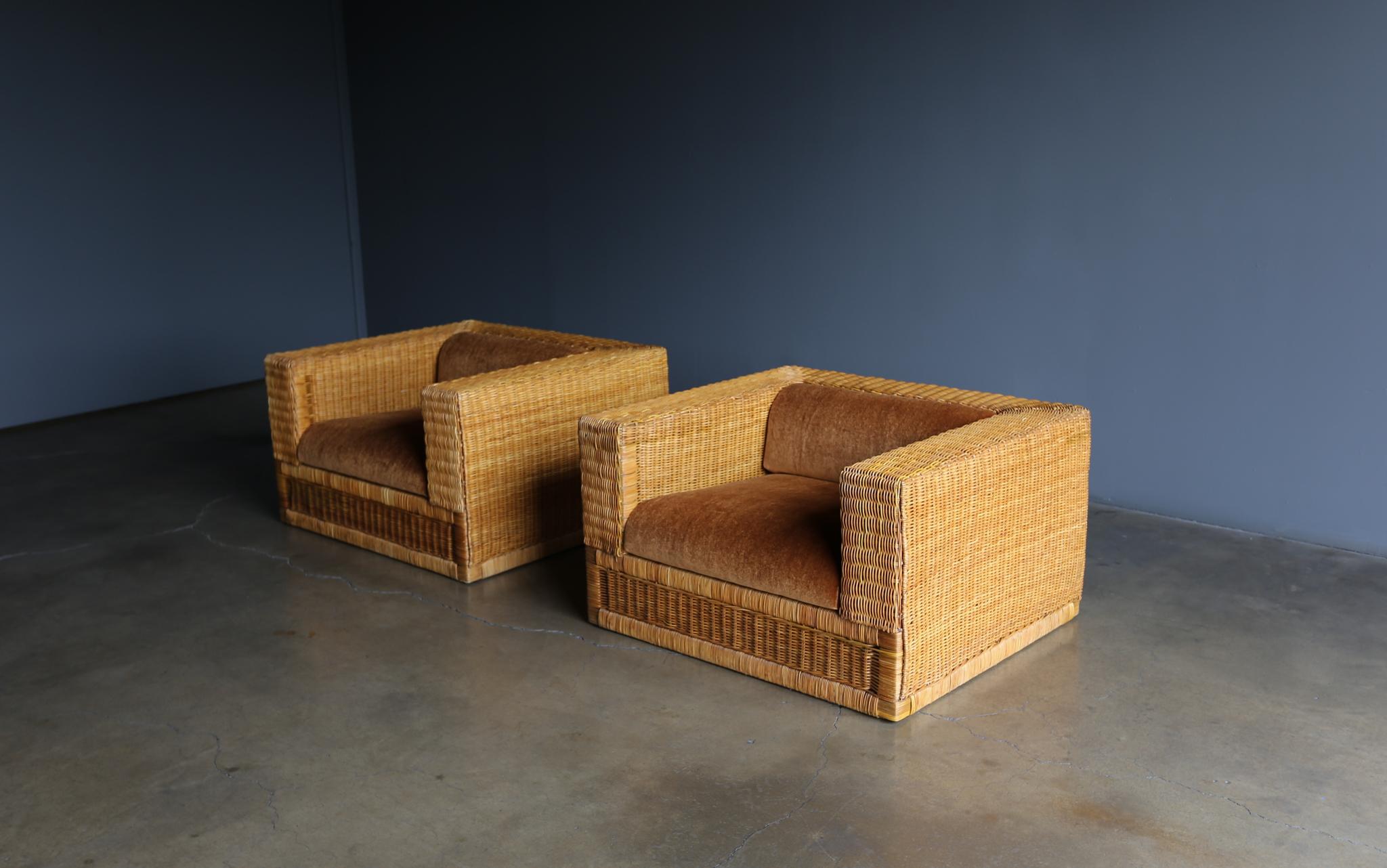 Large scale Modernist Wicker & Mohair Lounge chairs, circa 1965. This pair has been expertly restored.