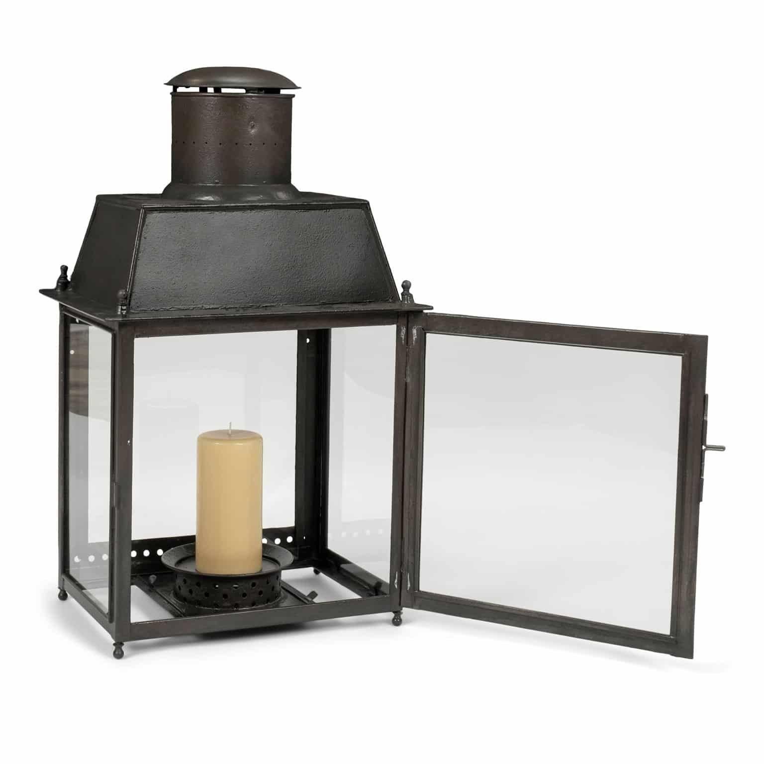 Large-scale pair of French tole lanterns. Late 19th century lanterns with glass-paneled sides. Suitable for table tops or can be wall-mounted. Lanterns are not electrified, but can be wired, or fitted for gas usage, for an additional cost. Newly