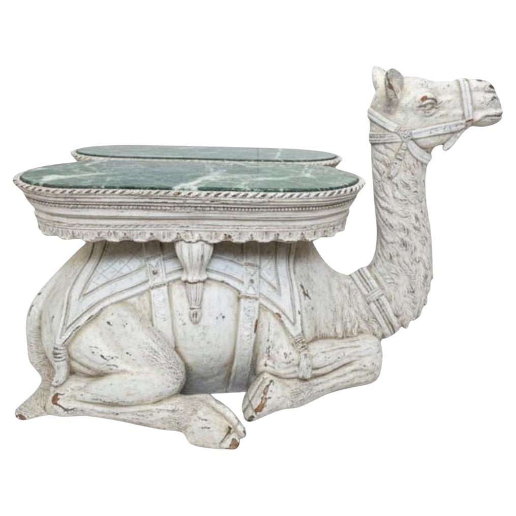 This is a fun large scale regency style camel form side table. It is a green marble top, and the piece is composition/ resin. It is in very good condition and attributed to Maitland-Smith. 