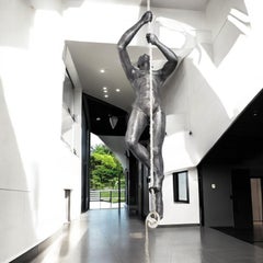 Large-Scale Rope Climbing Man by Phillips Collection, Installation