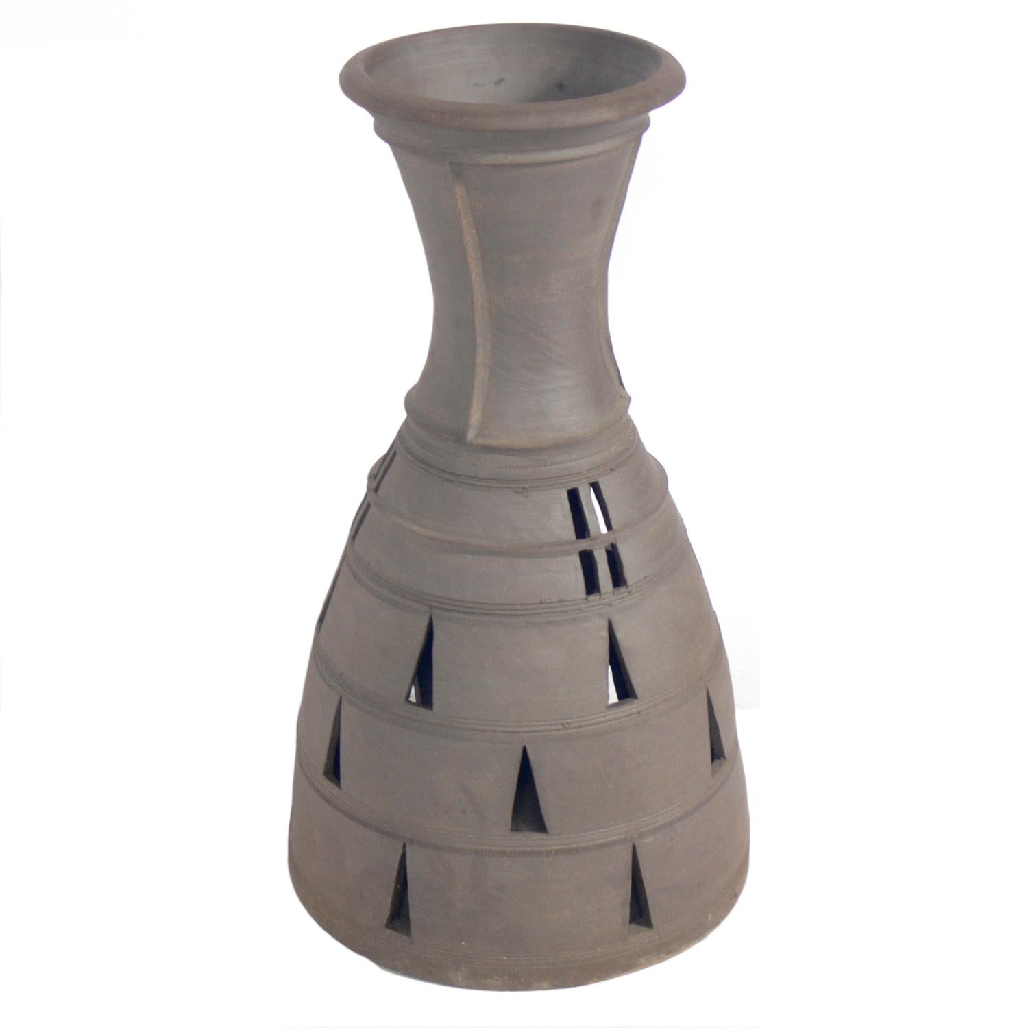 Large scale sculptural ceramic vase, believed to be American, circa 1960s. It is signed with the artist's cipher, but we are unable to research the artist. It stands an impressive 29