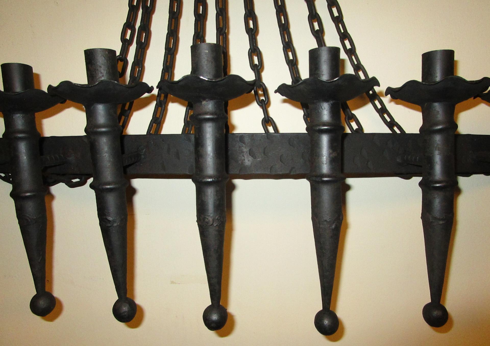 Spanish Colonial Large Scale Spanish Revival Hand Forged Wrought Iron 9 Light Wall Sconce
