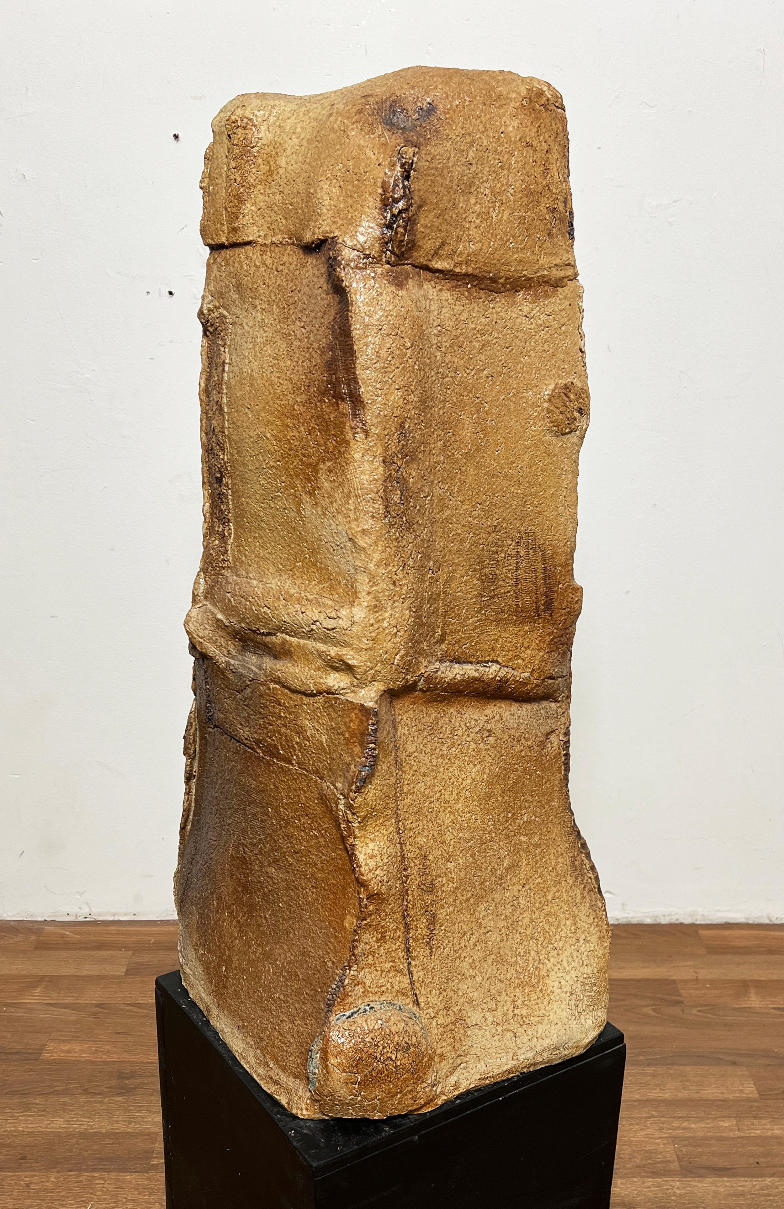 Stacked stoneware floor sculpture in salt glaze on wooden pedestal in the manner of Peter Voulkos, circa 1970s.