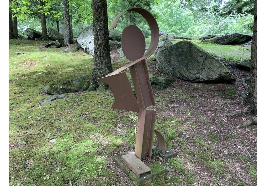 A large and very well crafted welded steel sculpture with a whimsical and very Pop Style aspect. Made by multi-disciplinary artist Norma B. Flanagan. The sculpture in steel originally painted, now worn to bare metal in a charming rust patina. A tall