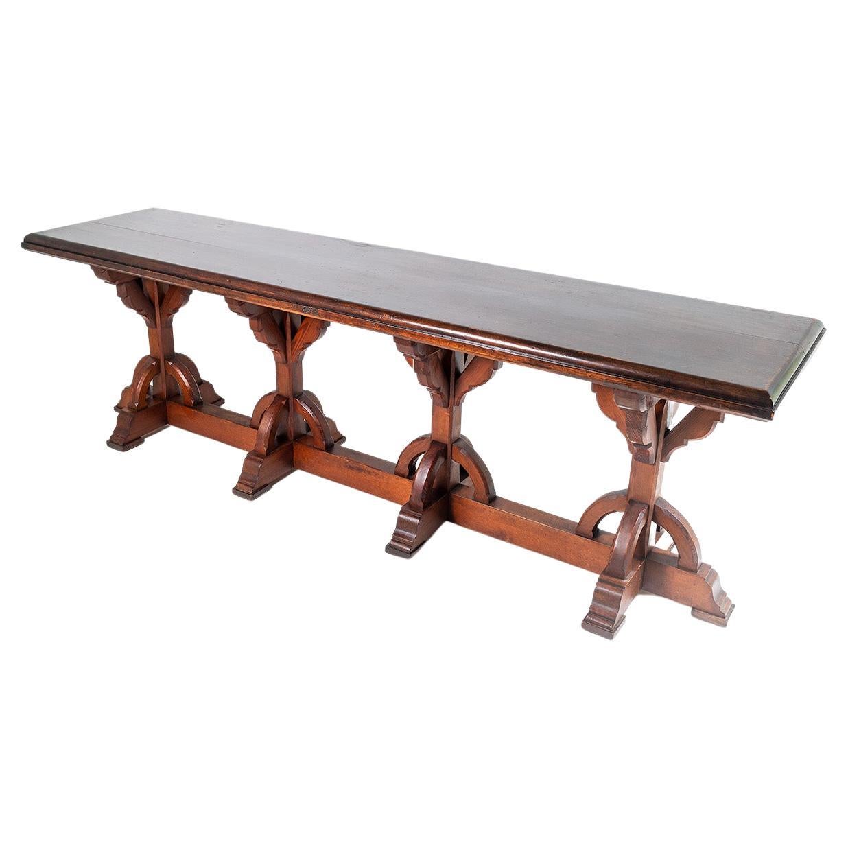 A superb 19th century Gothic Revival centre table in the manner of A.W.N Pugin (unattributed). Would make a wonderful serving table or large console table. Narrow form make this piece versatile for use in a Hallway or corridor.

A large scale