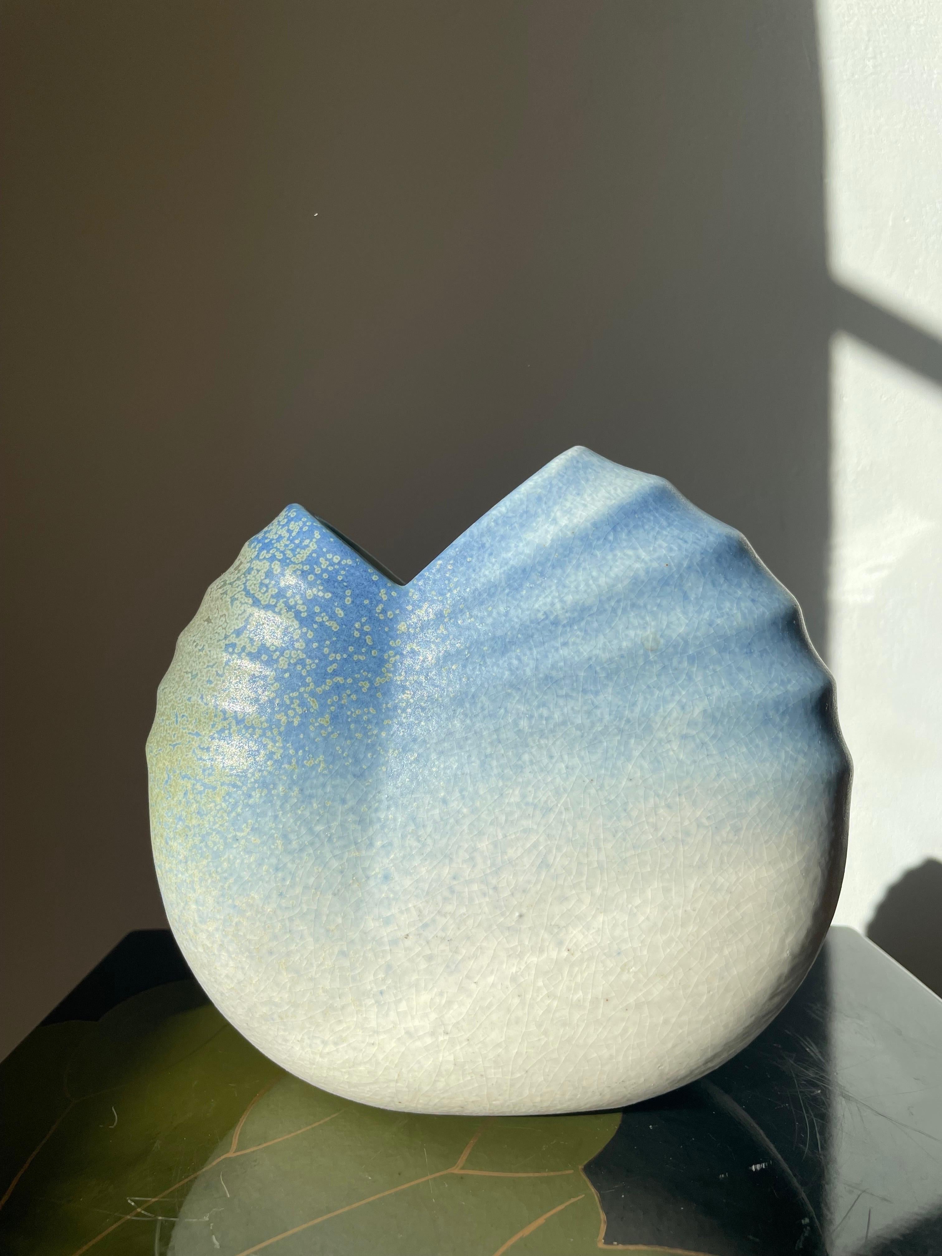 Organic Scandinavian Modern scalloped asymmetrical vase with stunning matte aqua glaze. Green, blue and white colors over soft ripples. Stamped under base with original label. Beautiful vintage condition.